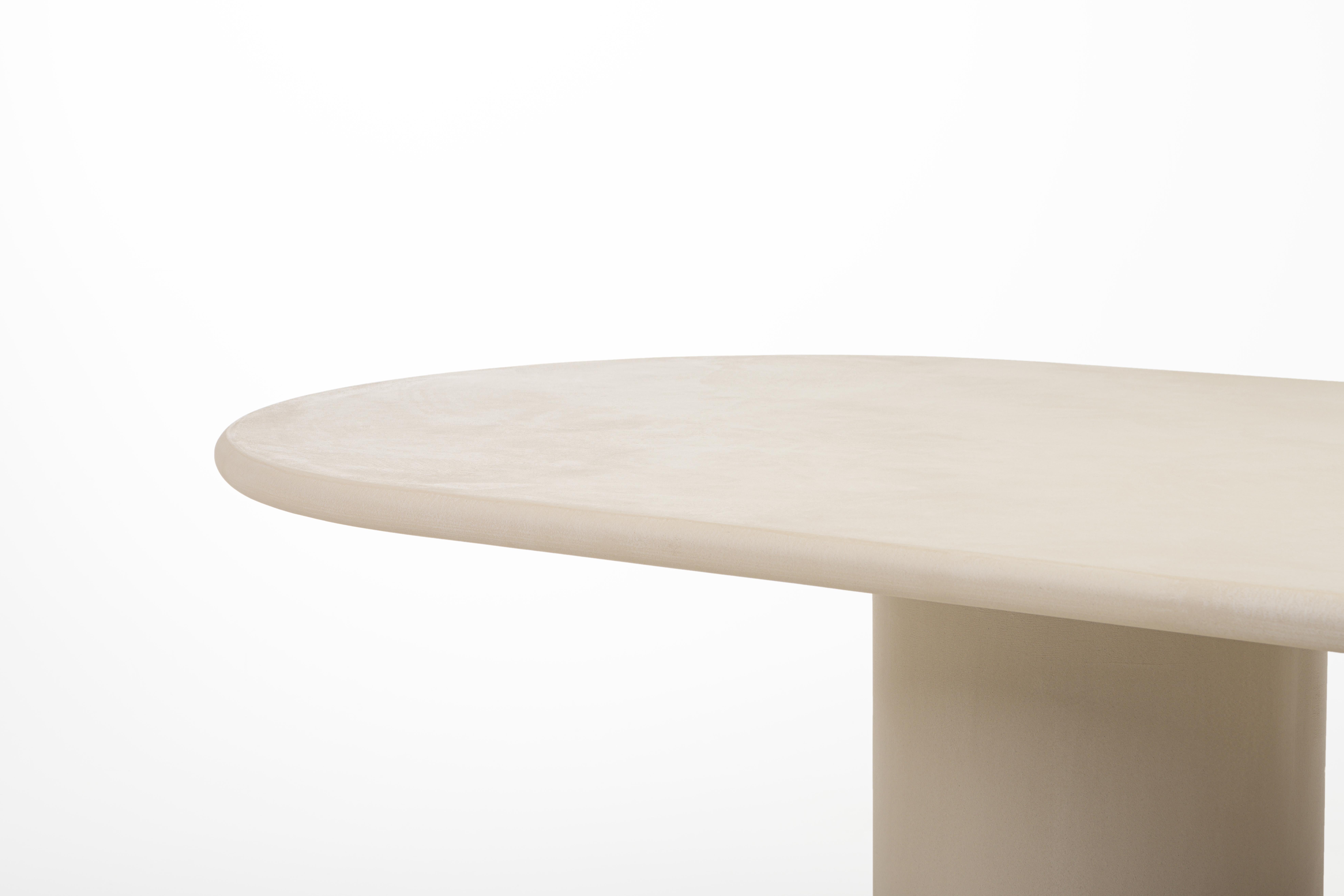 Contemporary Belgian design, handmade natural plaster table with a textured and earthy character.

Indoor use (price outdoor +10%)

Latin adjective “columna” /koˈlum. na/: column, pillar

The Column dining table is handcrafted with multiple layers