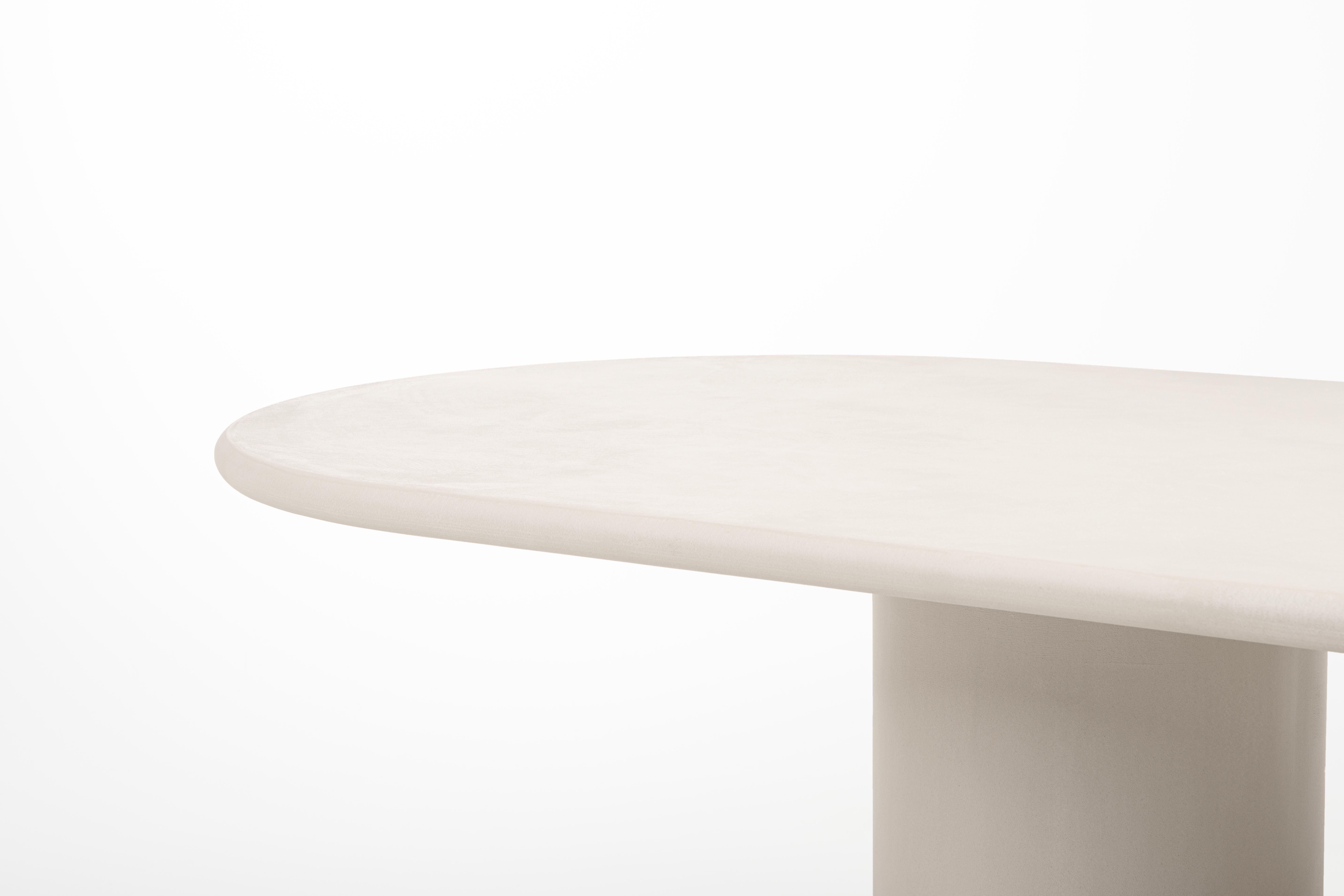 Contemporary Belgian design, handmade natural plaster table with a textured and earthy character.

Indoor use (price outdoor +10%)

Latin adjective “columna” /koˈlum. na/: column, pillar

The Column dining table is handcrafted with multiple layers