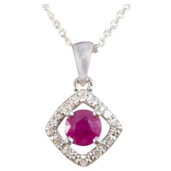 Contemporary Ruby and Diamond Halo Pendant Necklace in 9ct White Gold