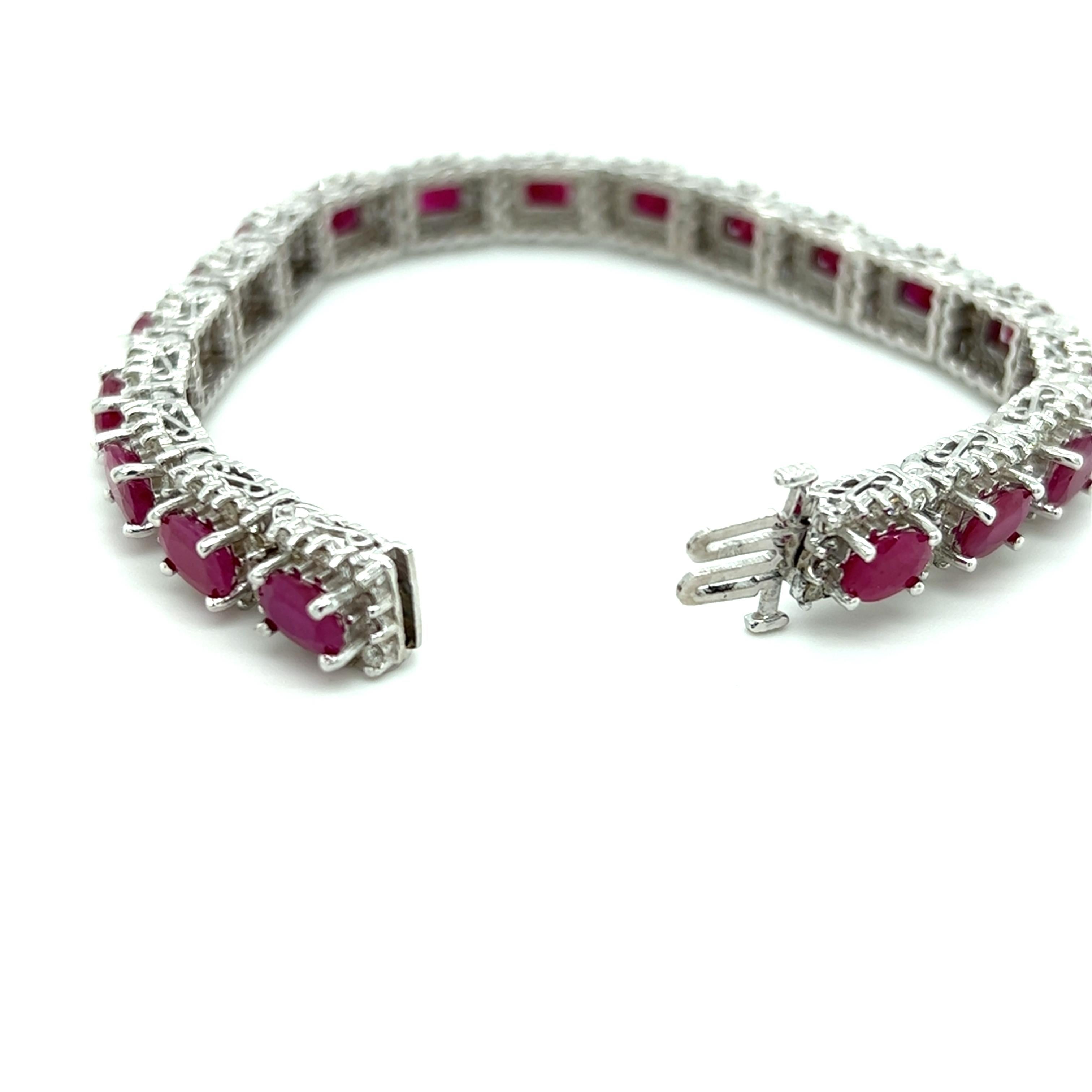 Oval Cut Contemporary Ruby and Diamond Line Bracelet in 14K White Gold  For Sale
