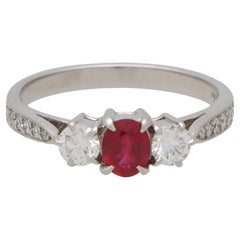 Contemporary Ruby and Diamond Ring with Diamond Shoulders in Platinum