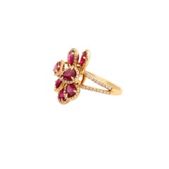 Contemporary Ruby Flower Ring with Diamond Halo Petals in Lustrous Yellow Gold