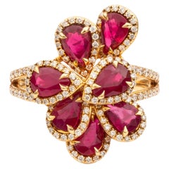 Contemporary Ruby Flower Ring with Diamond Halo Petals in Lustrous Yellow Gold