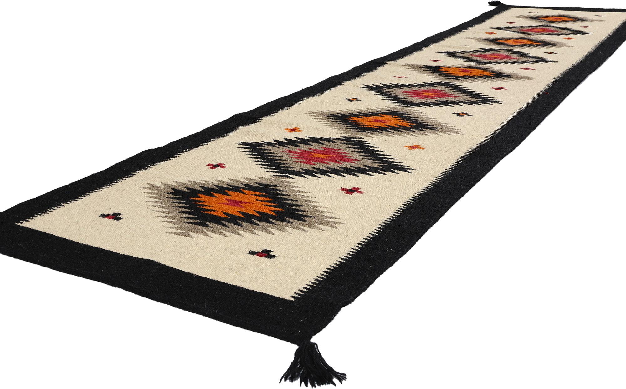 81049 Southwest Modern Ganado Navajo-Style Rug Runner, 02'07 x 12'01. Transform your living space with the captivating allure of Southwest Modern aesthetics embodied in this meticulously handwoven wool Ganado Navajo-style rug runner. A testament to