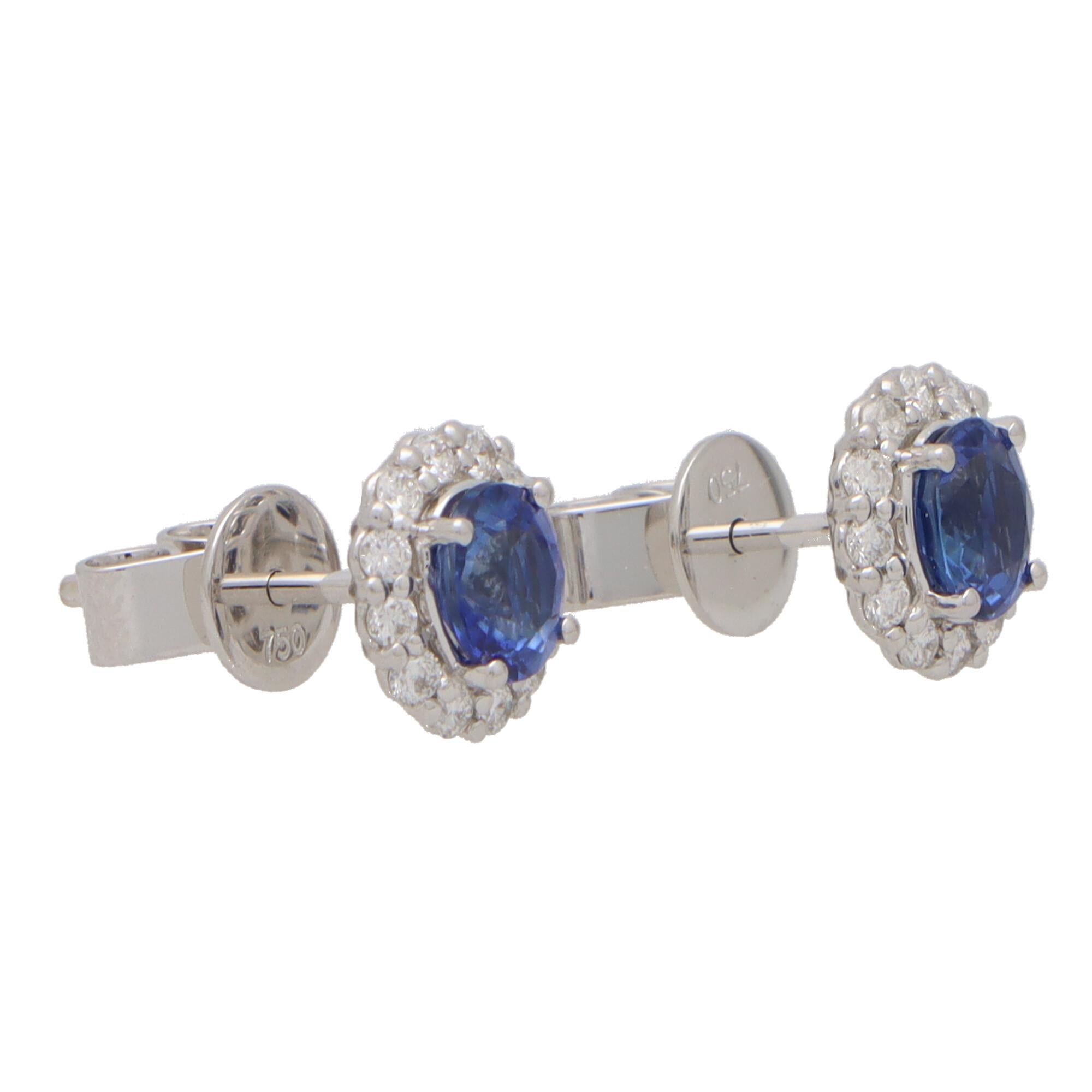 Oval Cut Contemporary Sapphire and Diamond Cluster Earrings Set in 18k White Gold