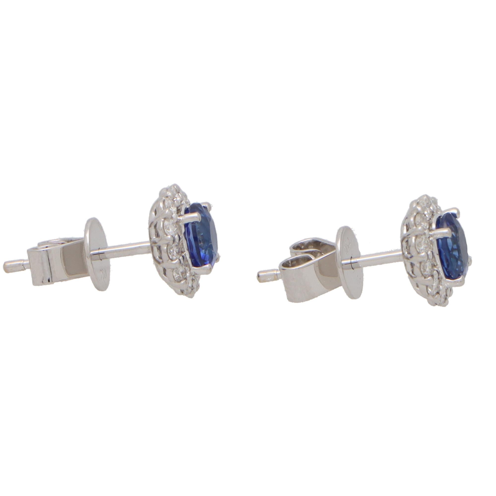 Contemporary Sapphire and Diamond Cluster Earrings Set in 18k White Gold In Excellent Condition In London, GB