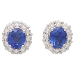 Contemporary Sapphire and Diamond Cluster Earrings Set in 18k White Gold