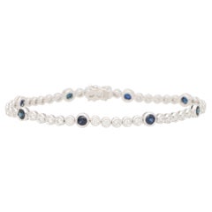 Contemporary Sapphire and Diamond Line Bracelet in 18k White Gold