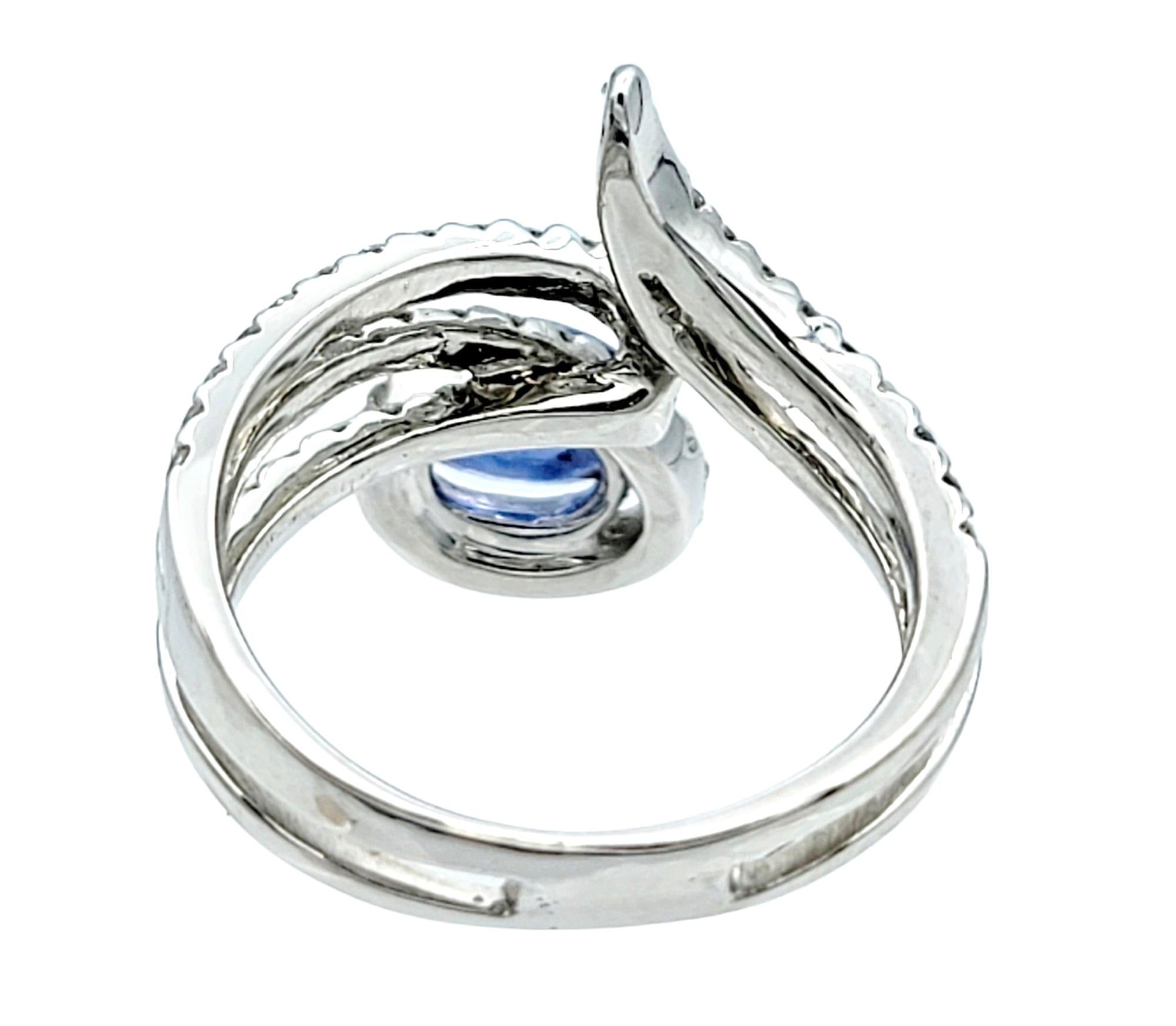 Women's Contemporary Sapphire and Diamond Split Shank Bypass Wrap Ring in 18 Karat Gold For Sale