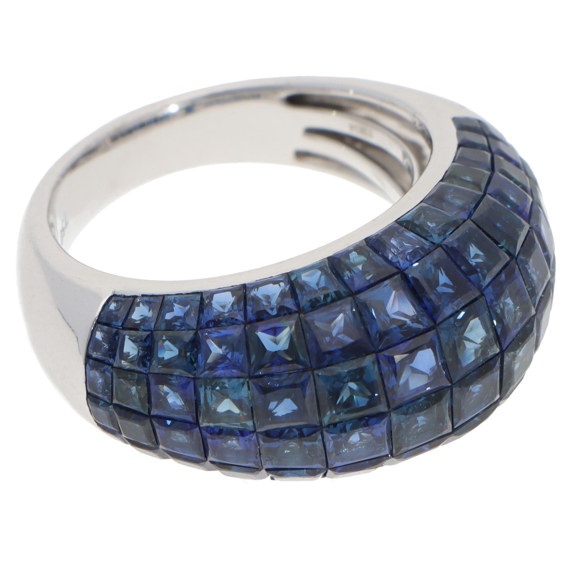 French Cut Contemporary Sapphire Invisible Set Bombe Ring in White Gold For Sale
