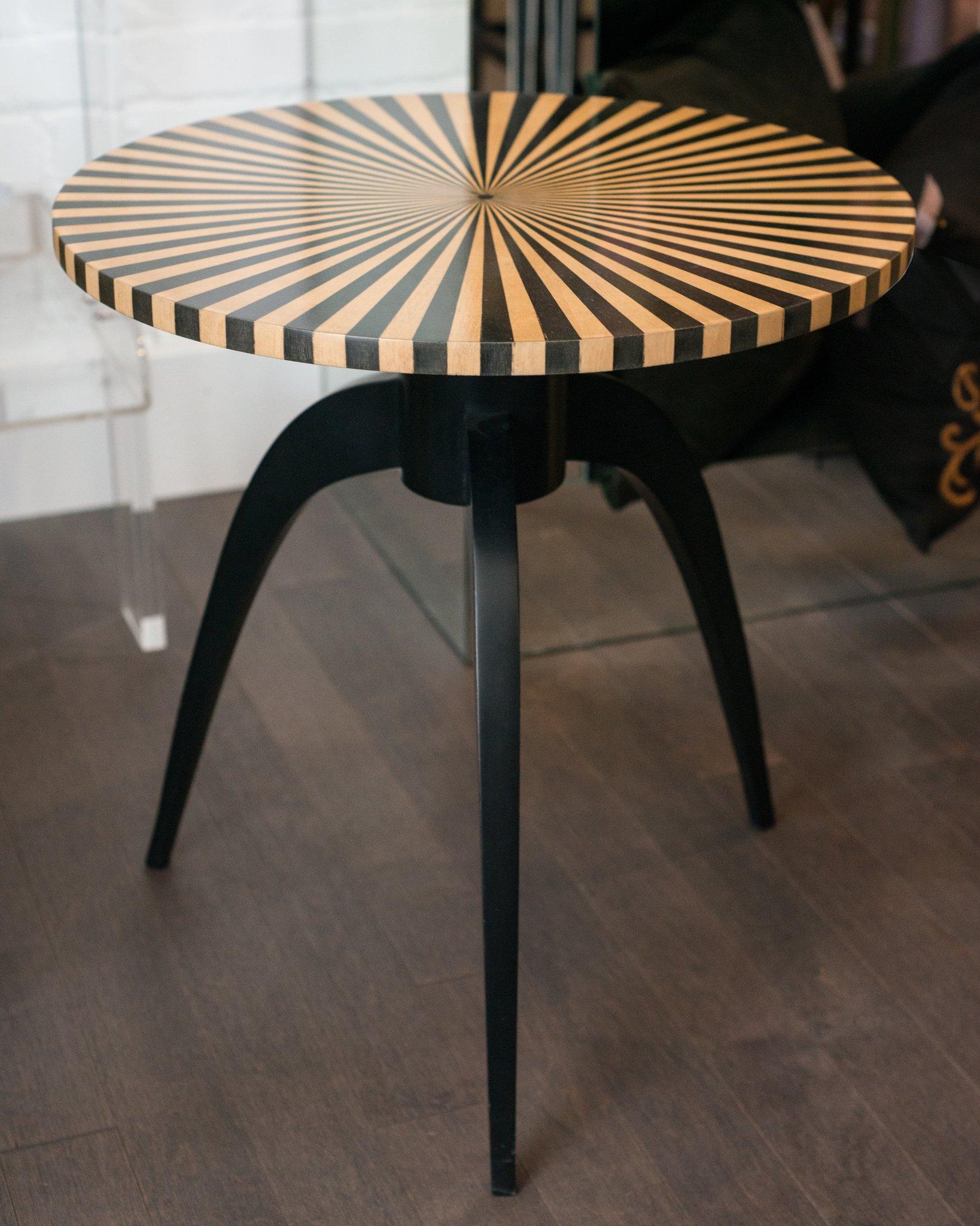 A beautifully made contemporary table in inlaid satinwood, a nod to Fornasetti. Alternating inlaid panels create a strong geometry in a natural tone.