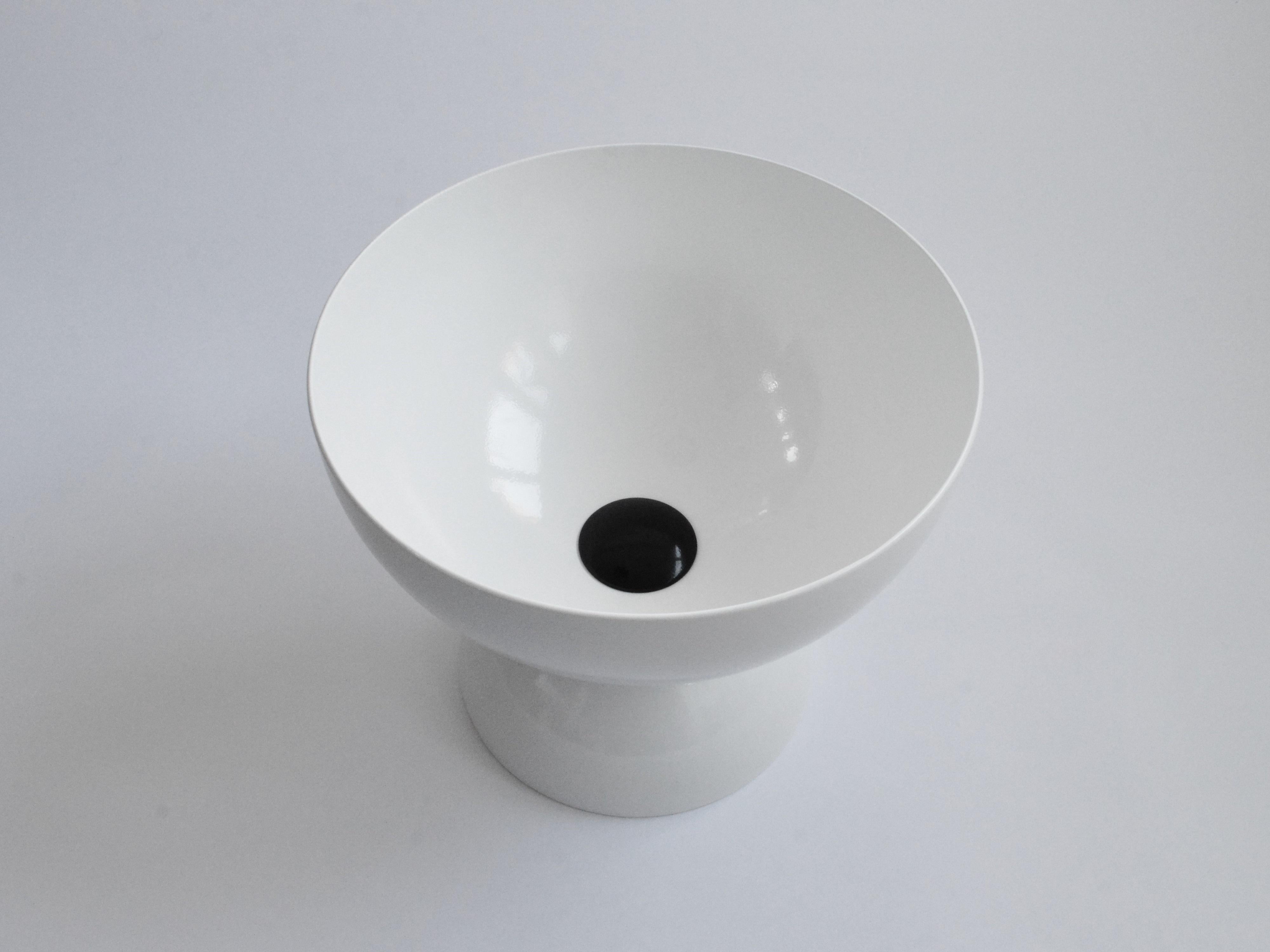 The Saturn Bowl combines contemporary design style with functionality, its simple sculptural form and heavy duty construction makes it an ideal vessel for decorative displays. Created using a large 30cm diameter hemisphere, the bowl has the capacity