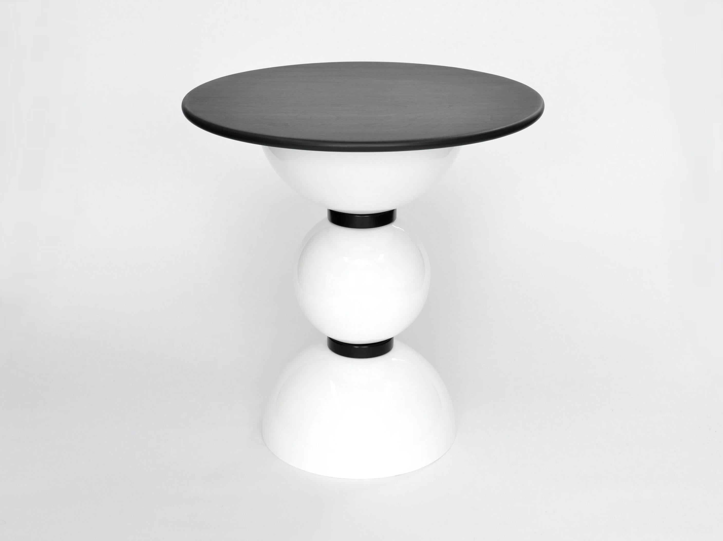 Contemporary side table designed and made by independent product and furniture designer Connor Holland.

The Saturn table is part of the Saturn six range, a series of designs inspired by space exploration and the Saturn V rocket. The rounded