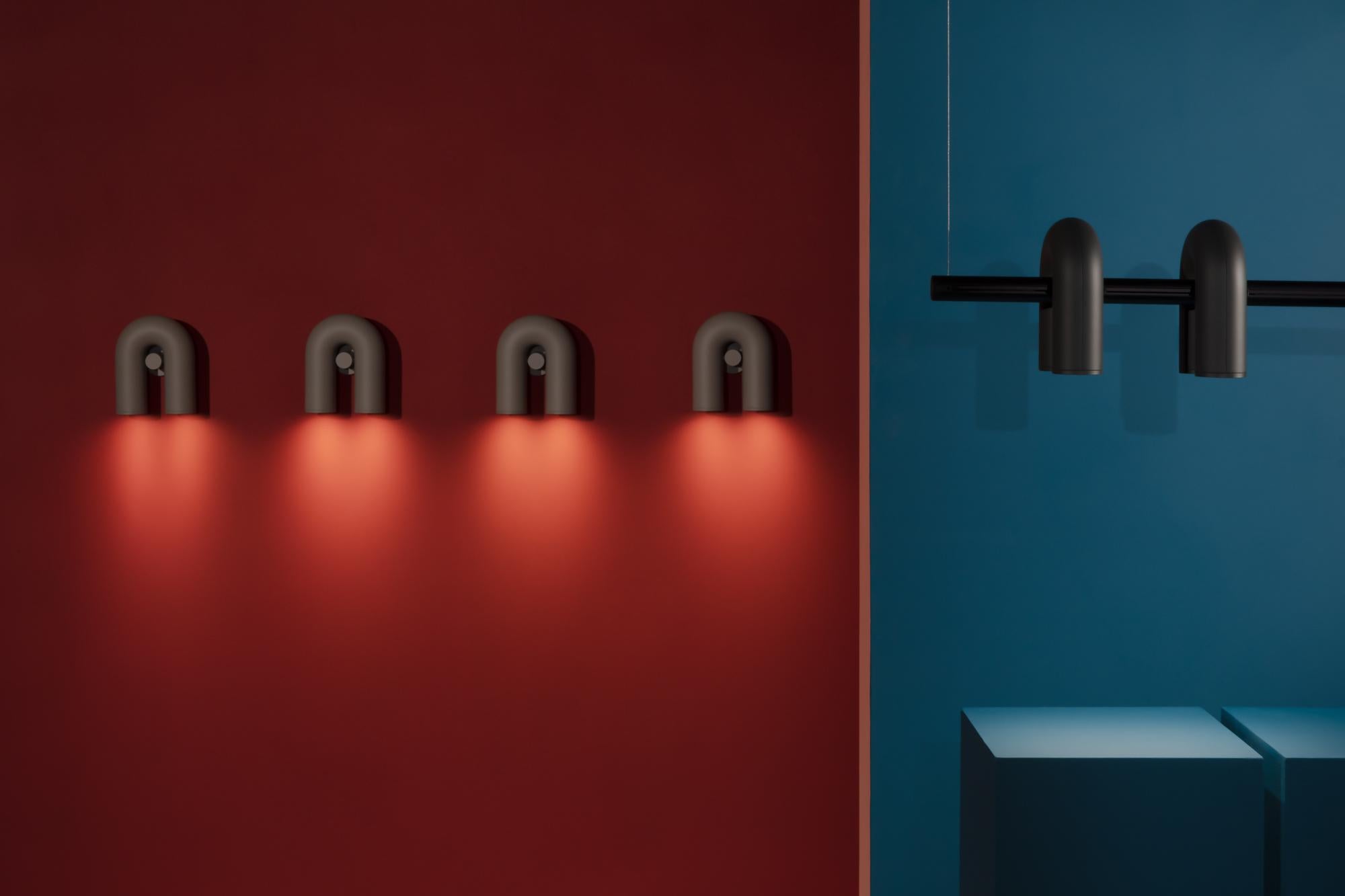 Cirkus wall lamps by AGO Lighting
Coated ABS, aluminum

UL Listed
LED GU10 110-240V (not included)

Four colors available: Charcoal, grey, green, terracotta
Dimensions: 18 x 14,8 x 7,8 cm

--
AGO is a Korean design studio specialized in lighting.