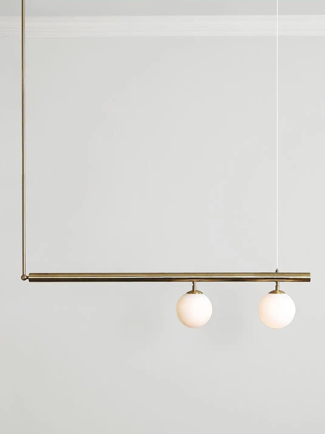 Contemporary Sculpted Brass Pendant, Satellite 2 by Paul Matter

Satellite is inspired by the conceptual and minimalist movement of the 1960s and 1970s. These light sculptures are fundamentally geometric and architectonic.
They rely on the cube as