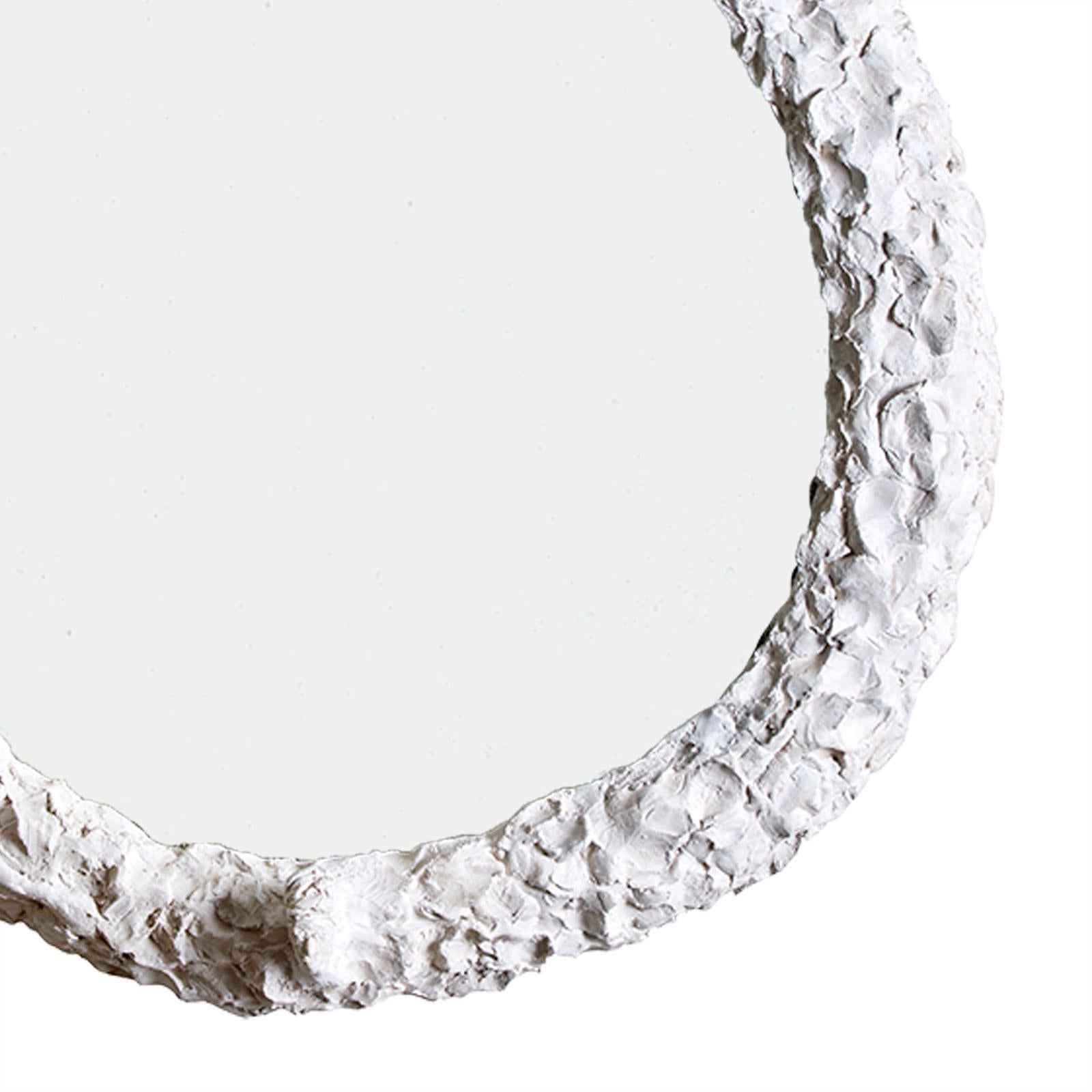 Margit Wittig's classical yet curious mirrors are filled with individuality.
With her artistic eye, Margit’s hand-sculpted, textural frames have a signature portrait head placed at the lowest point.
Each mirror is cast, applying multiple layers of