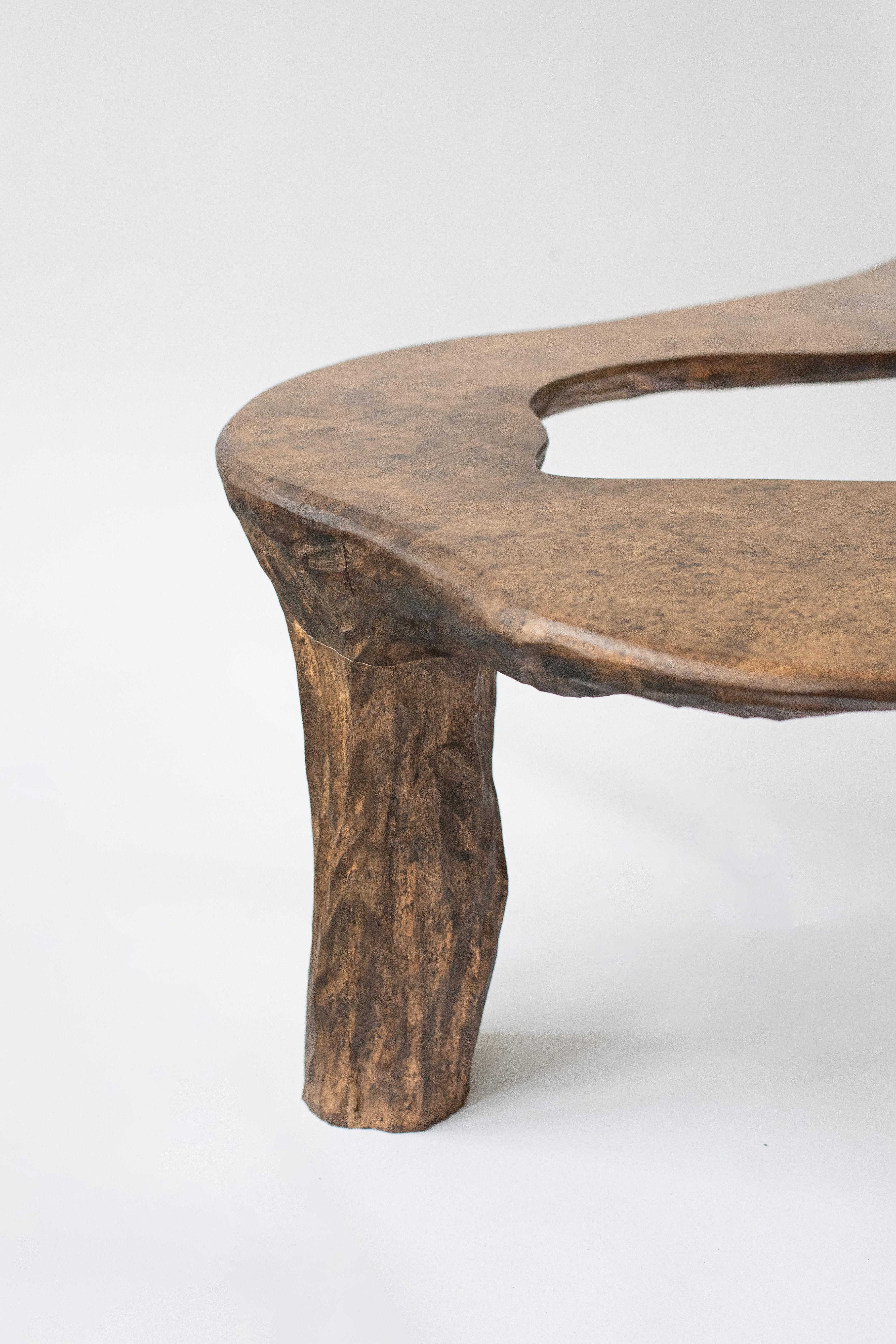 Intuitive Archaisme is a collection of furniture whose design and manufacturing process is based on the primitive instinct of assembling shapes to create a structure. The wood is worked with a gouge, revealing its structure as the tool passes over