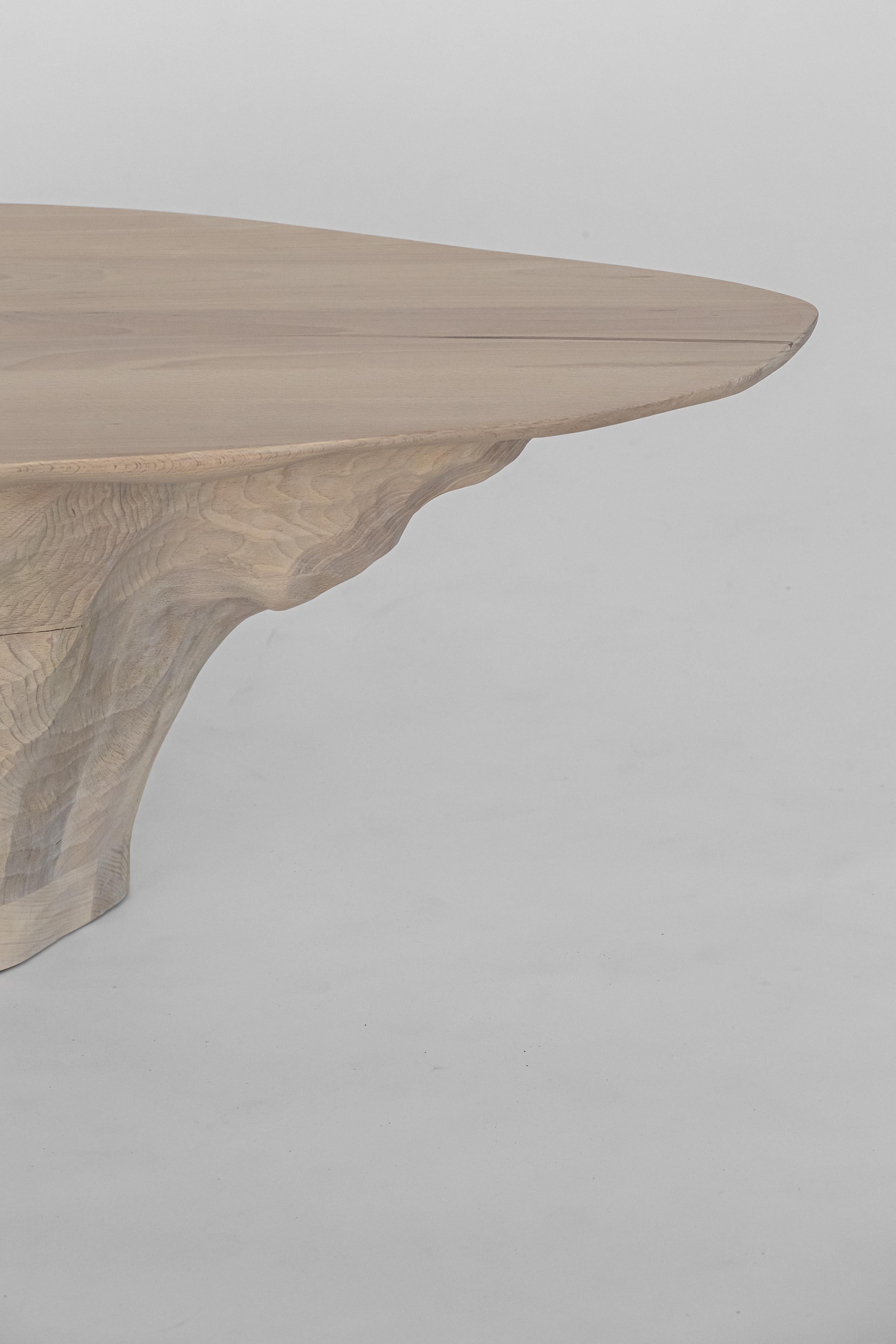 Intuitive Archaisme is a collection of furniture whose design and manufacturing process is based on the primitive instinct of assembling shapes to create a structure. The wood is worked with a gouge, revealing its structure as the tool passes over
