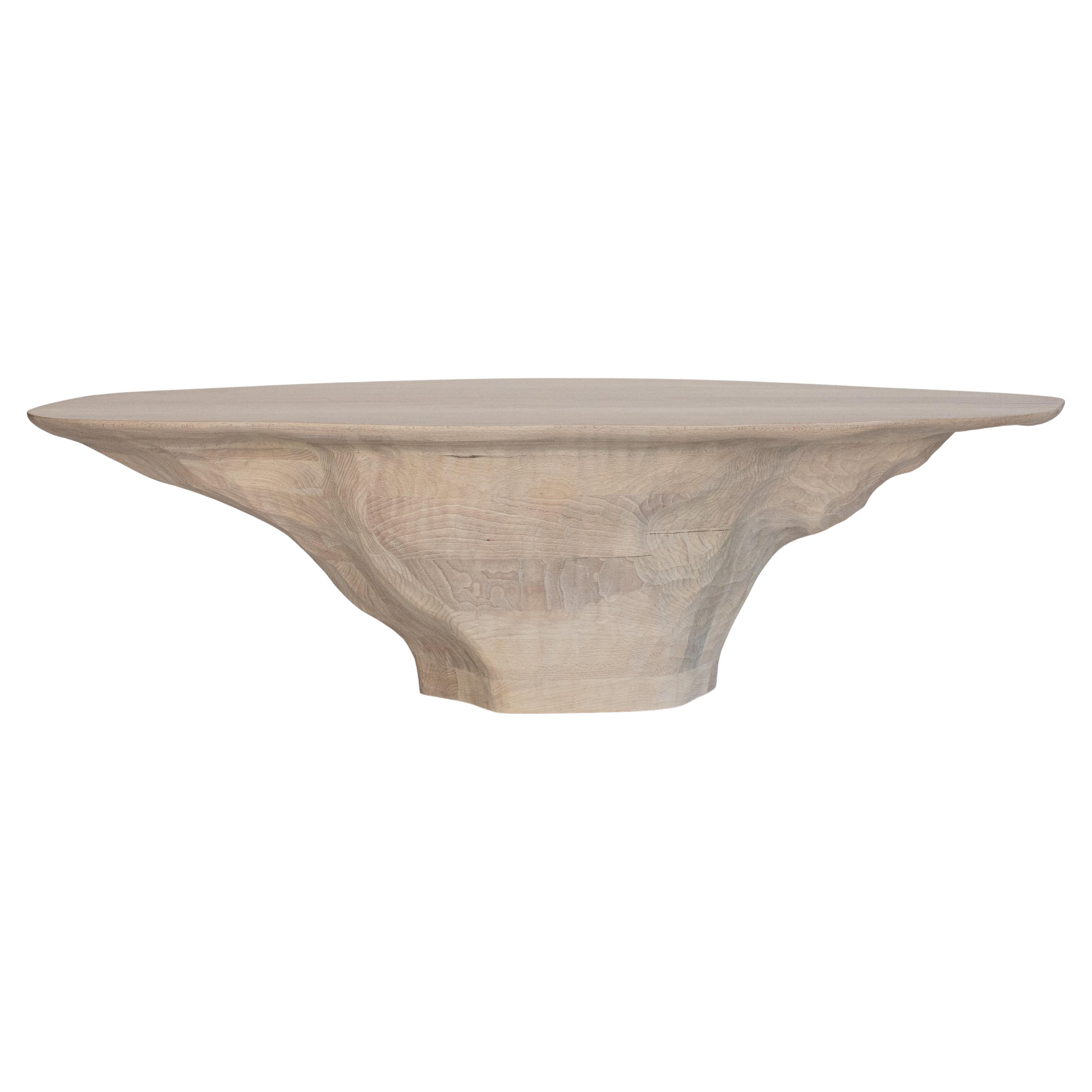 Contemporary sculpted wood INTUITIVE ARCHAISME, Ein massiver Couchtisch