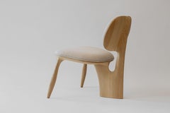 Contemporary sculpted wood Mobula Arm Chair