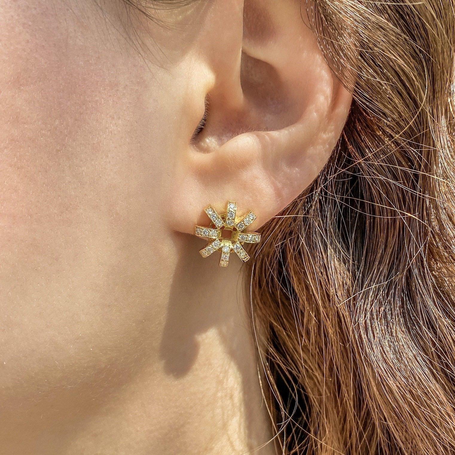 The 'Flower’, stud earrings are crafted in 18k gold, hallmarked in Cyprus. These elegant, diamond ear studs, come in a highly polished finish and feature White, VS Diamonds, totaling 0,48 Cts. The 'Flower’, stud earrings are part of Maria Kotsonis’s