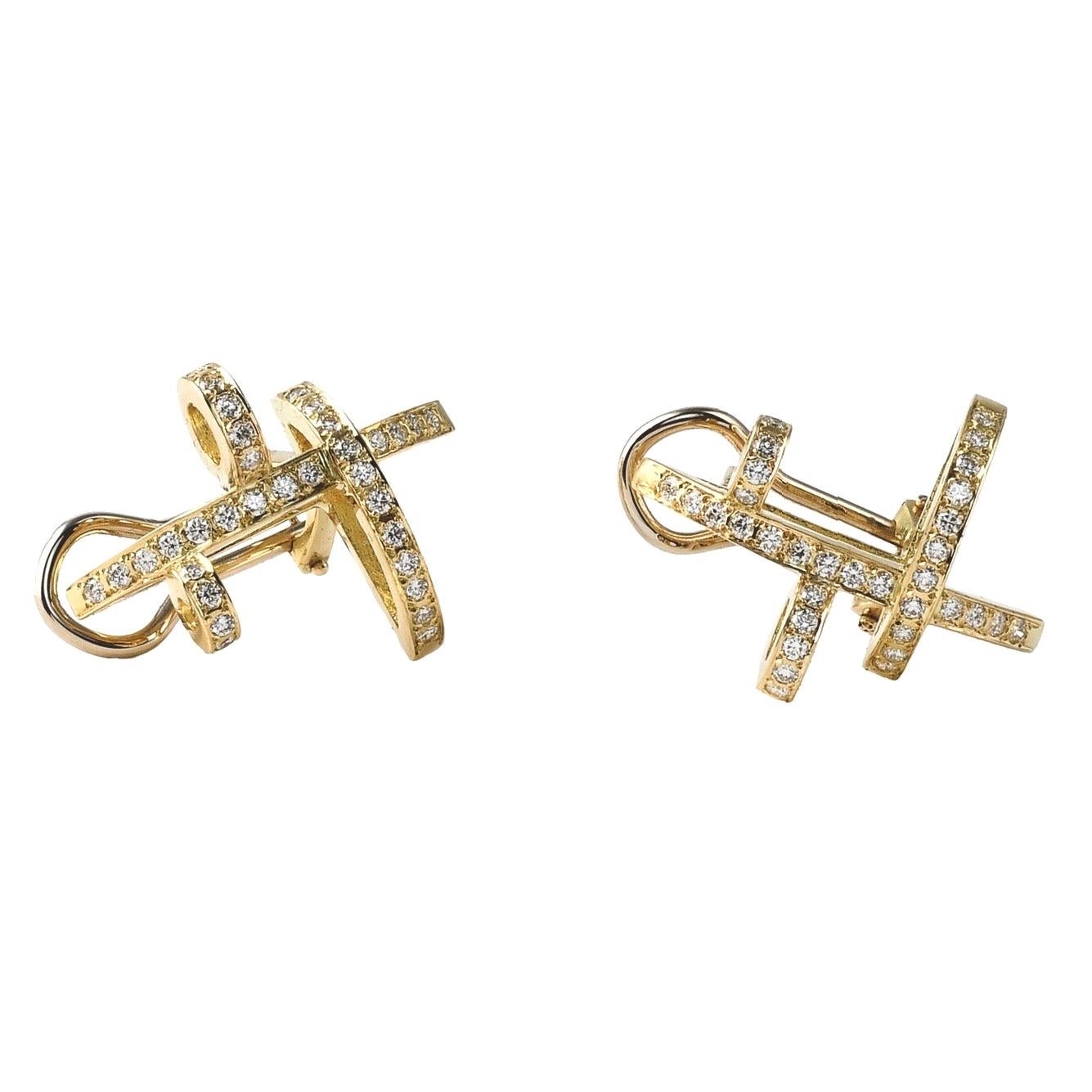 Clips d'oreilles contemporains sculpturaux en or jaune 18 carats et diamants blancs