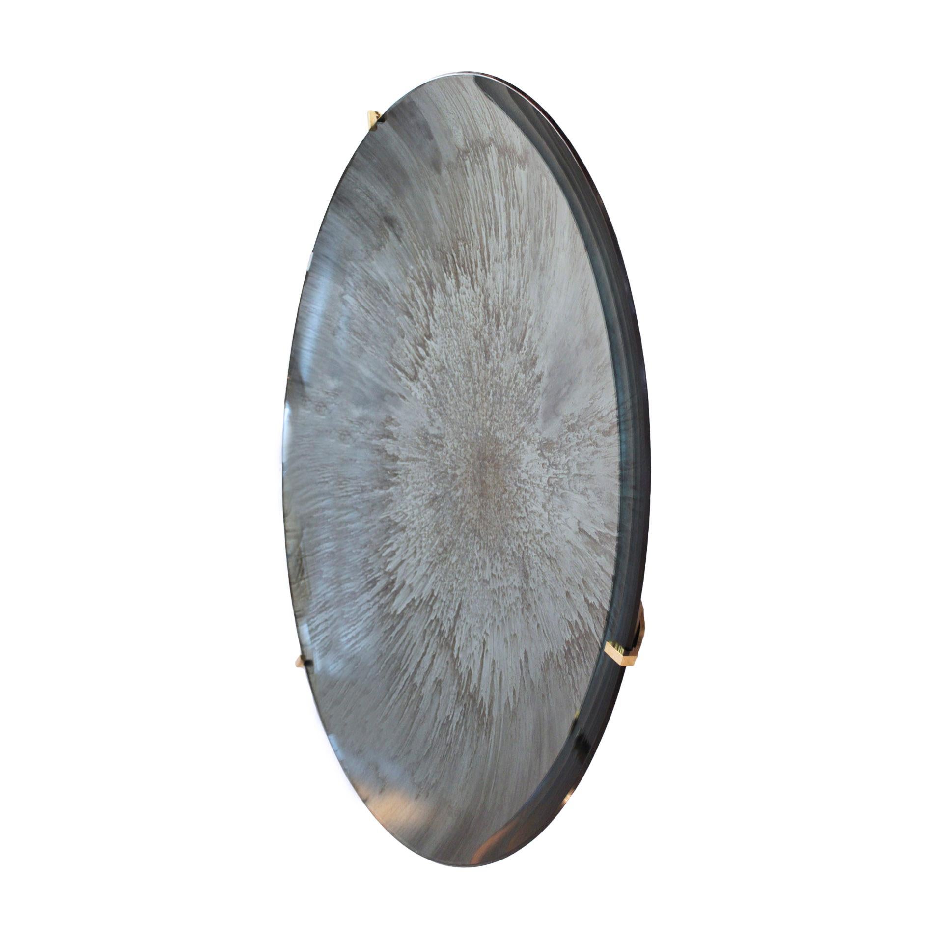 Modern sculptural beautiful concave French mirror. Wall hanging artwork handmade in bluemolded glass. Finished with bronze finial details on the back to hang on the wall. Unique piece. Made in France.

Every item LA Studio offers is checked by our