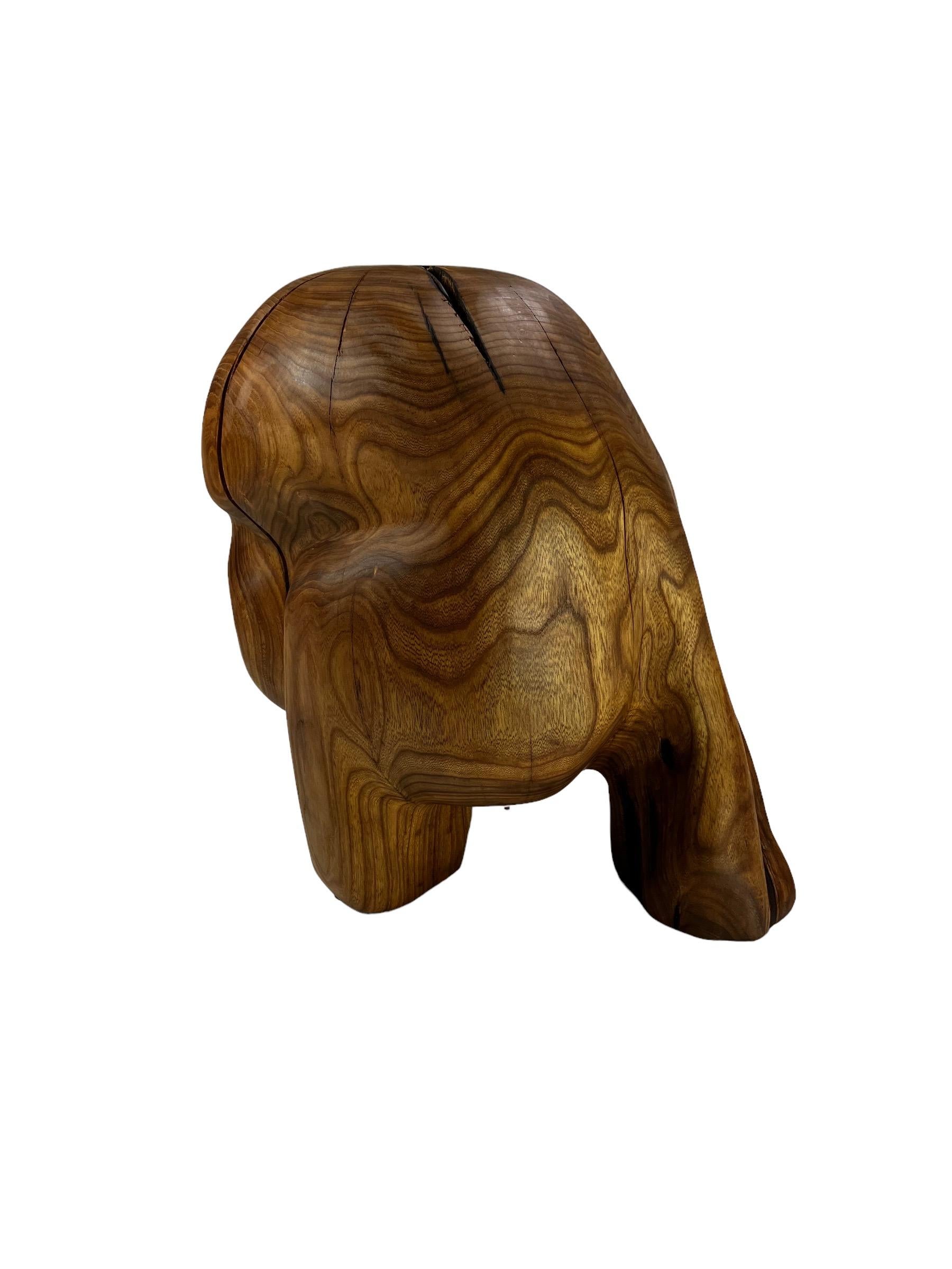 Contemporary sculptural carved wooden stool 
