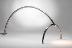 Moderne, skulpturale Stehlampe von Max Enrich aus poliertem Stahl