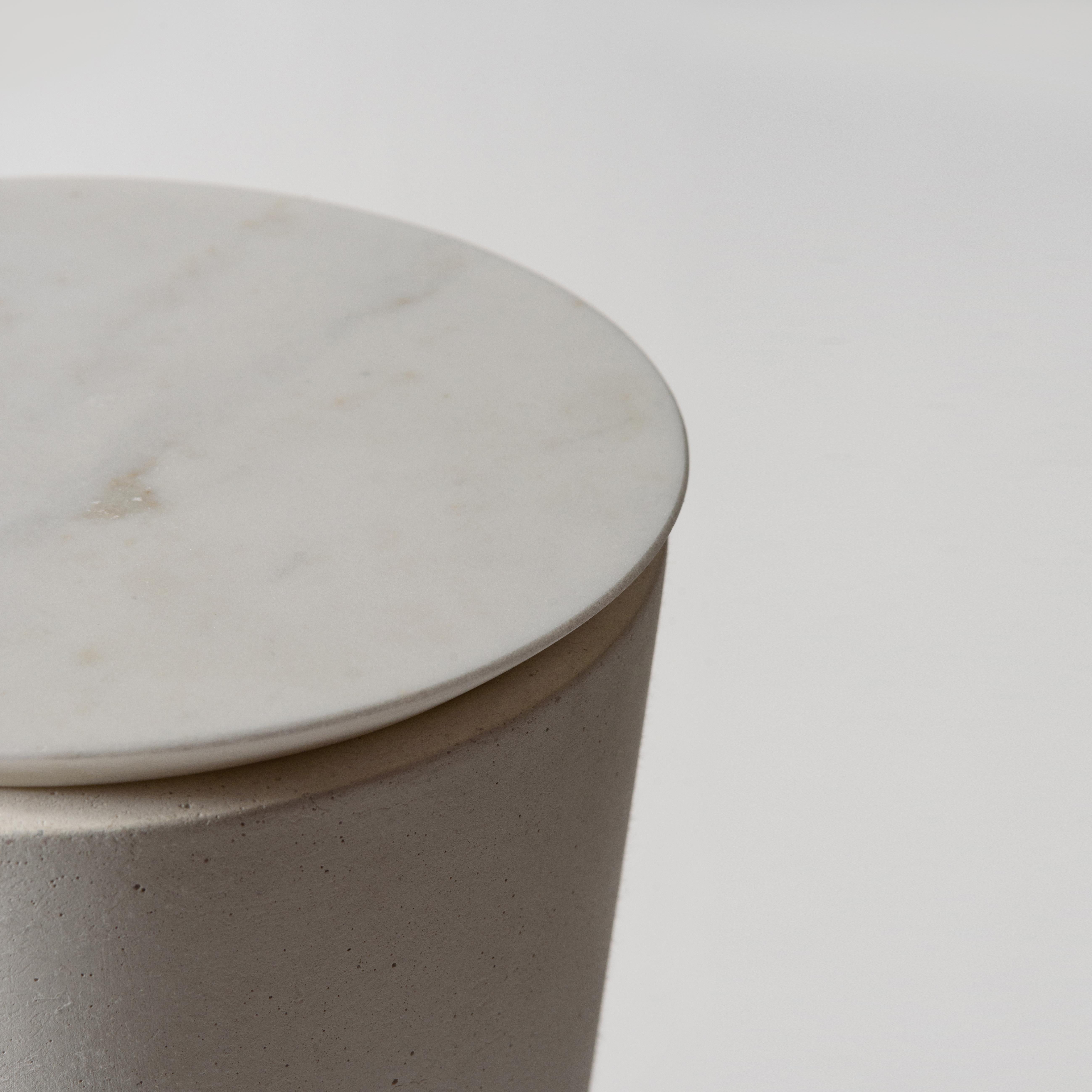 European 21st century sculptural handmade concrete, marble & stone 'PLINTH MARBLE' Table in White Handmade by Alentes.

The PLINTH MARBLE side table is both sculptural and functional, a friendly eclectic touch in any space. Its form resembles a thin