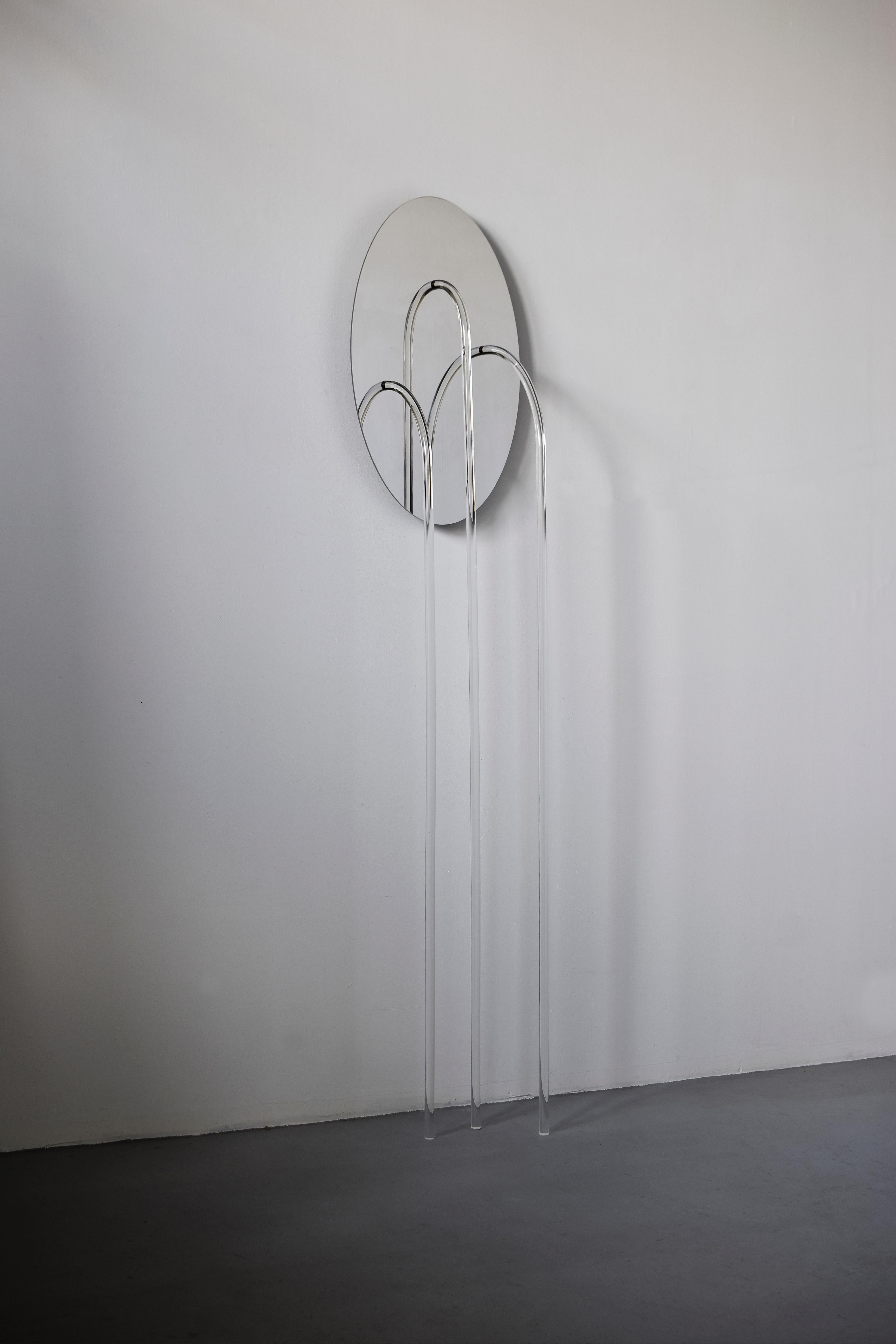 Elusive 06
A beautiful piece exploring the line between visible and invisible: half mirror, half floor lamp, half sculpture.
By Maximilian Michaelis.

Polished stainless steel, acrylic glass, Led
Measure: 200 x 40 x 30 cm.
