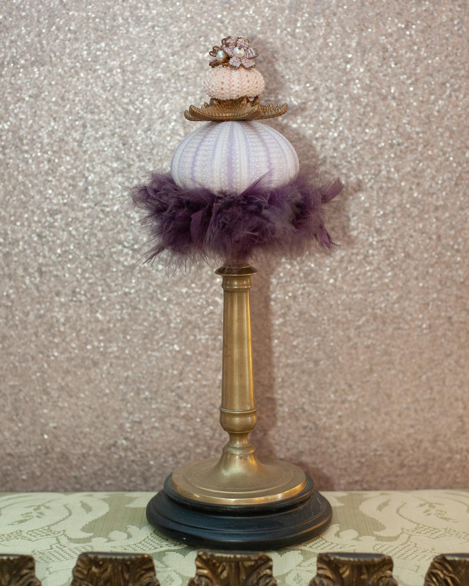 A contemporary curiosity objet made in Venice using antique brass components, feathers, and shells.