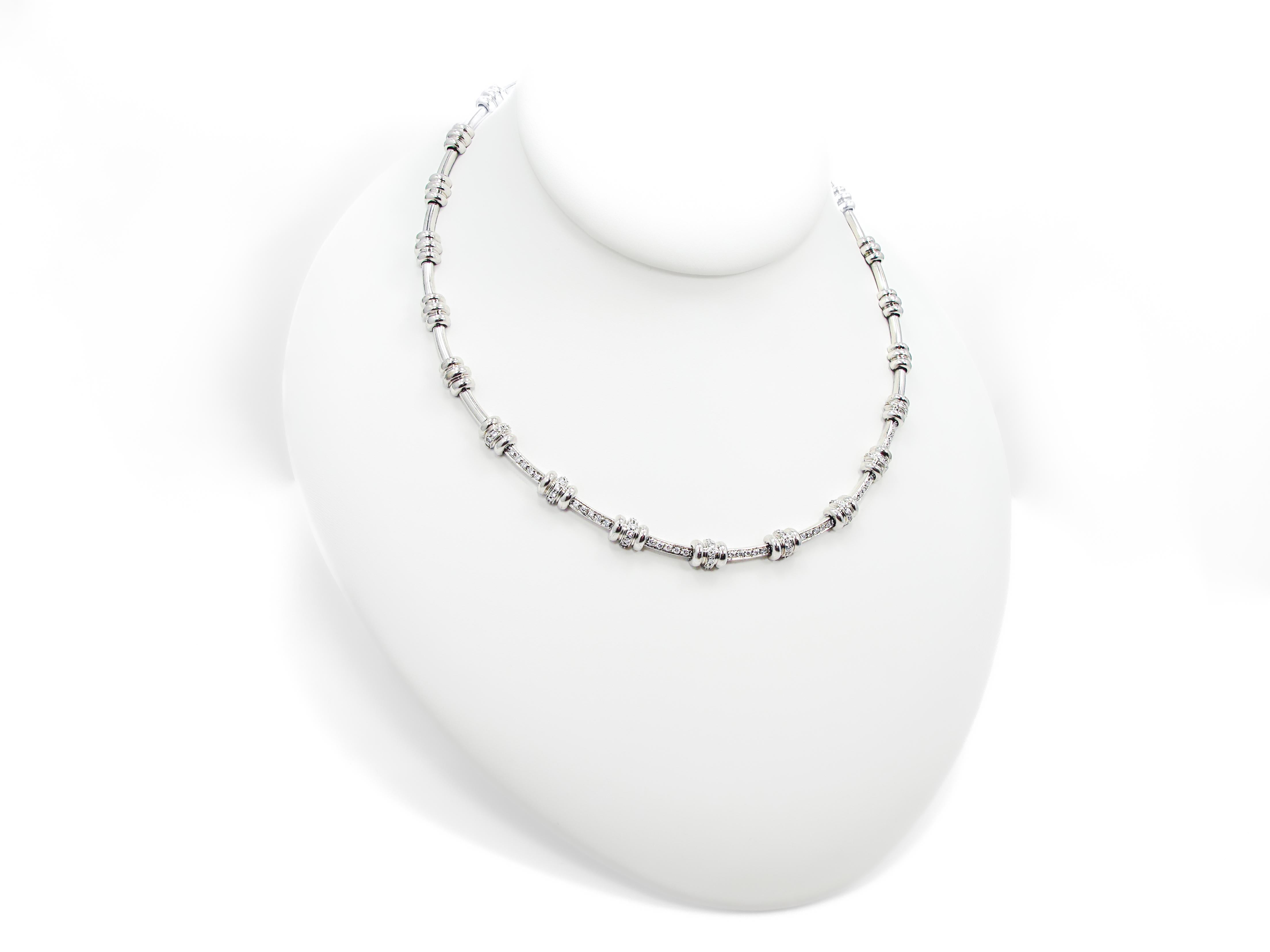 One 18k white gold and diamond necklace with 75 Round Brilliant diamonds, 0.85ct total weight of G color and VS clarity. The diamonds are bead set on front portion of the necklace only. The Necklace used but has been refreshed by our talented