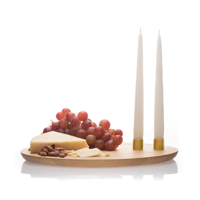 Inspired by the Italian notion of the art of being together at the table, Convivio makes contemporary and modern entertaining effortless, designed as both a candelabra and serving board centerpiece. Perfect for charcuterie, desserts or just about