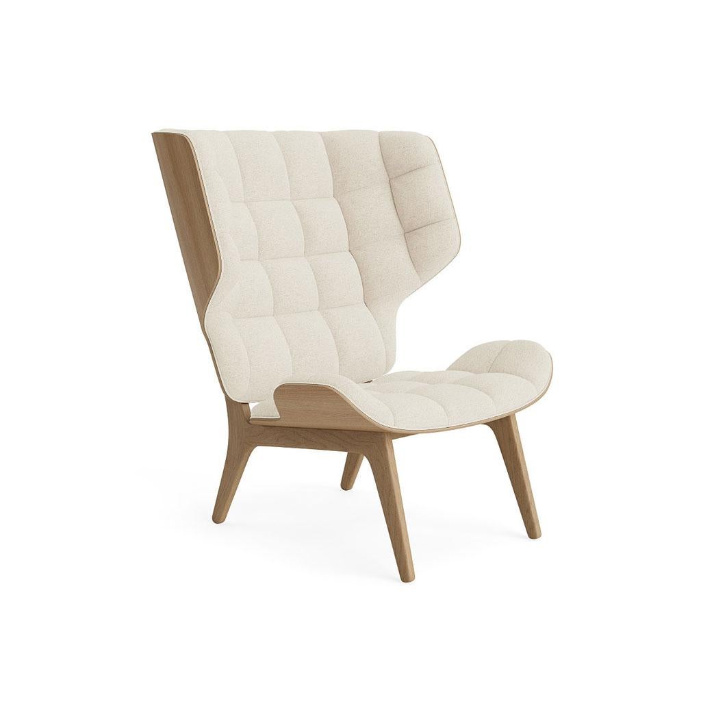 Mammoth chair + ottoman
Signed by Rune Krøjgaard & Knut Bendik Humlevik for Norr11. 

Dimensions:
- Chair: W 89 cm / D 87 cm / H 104 cm / SH 35,5 cm
- Ottoman: W 61,5 cm / D 53 cm / H 37 cm

Models shown on the picture:
Wood: Natural