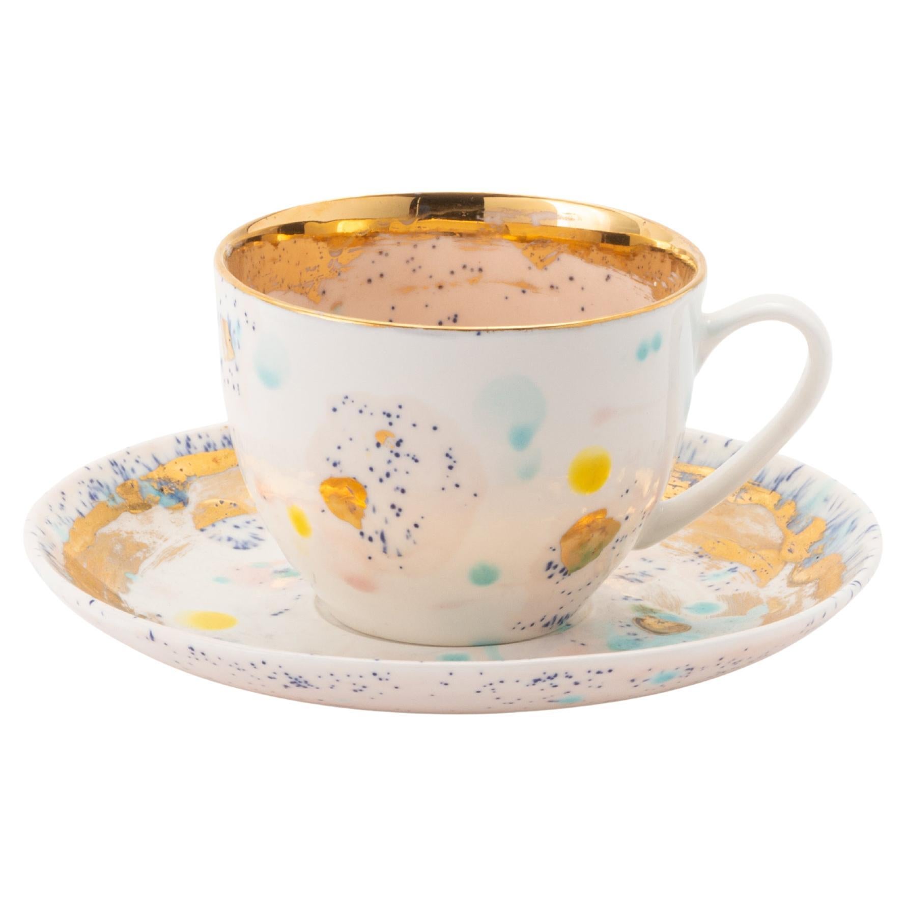 Ensemble contemporain de 2 tasses à thé et une soucoupe en porcelaine dorée peintes à la main