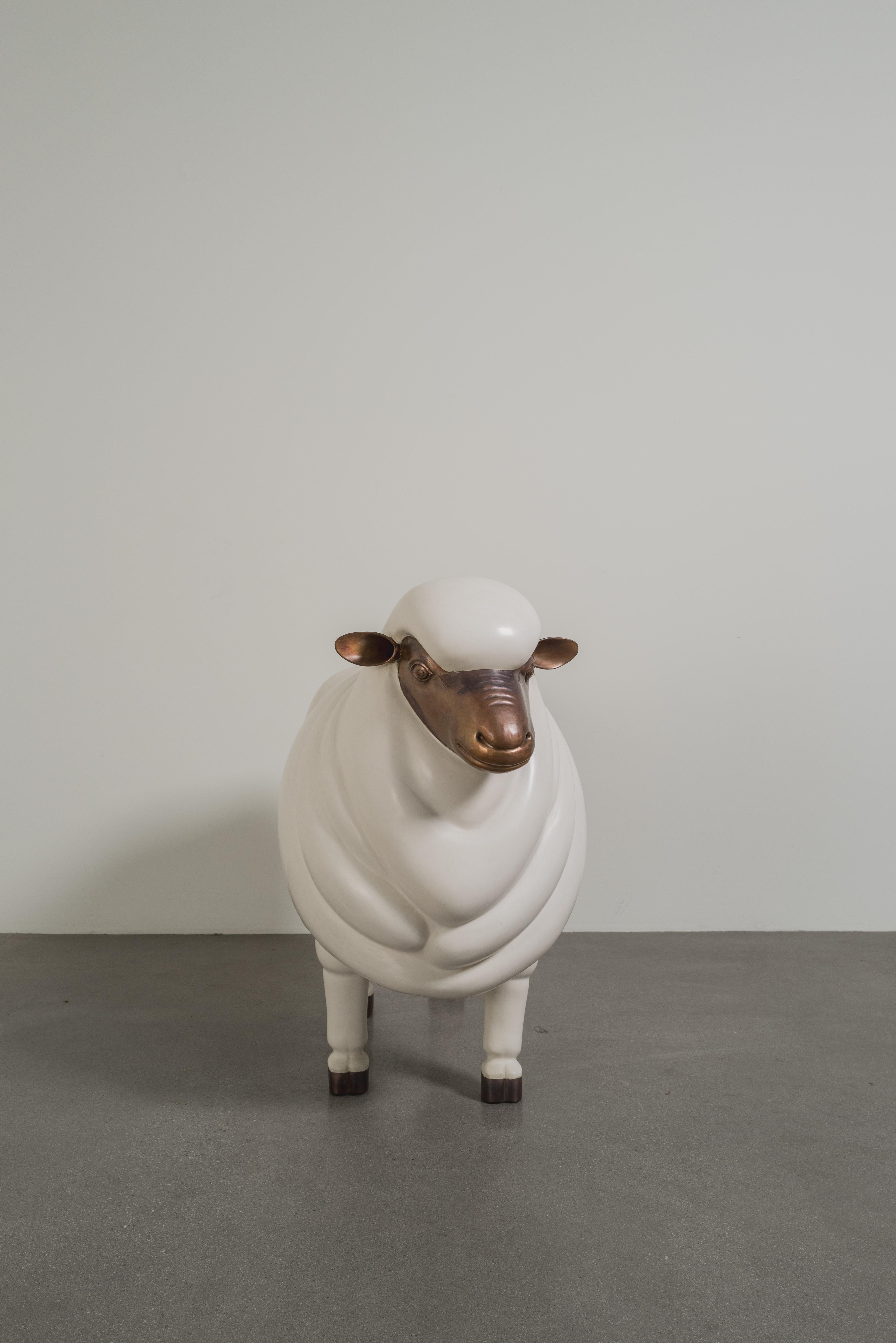 Sheep Sculpture (Female)
Cream Lacquer
Antiqued Copper
Hand Repoussé
Limited Edition
Contemporary
Sculpture has a lacquered body and exposed copper face and feet which can patina over time. 


Repoussé is the traditional art of hand-hammering