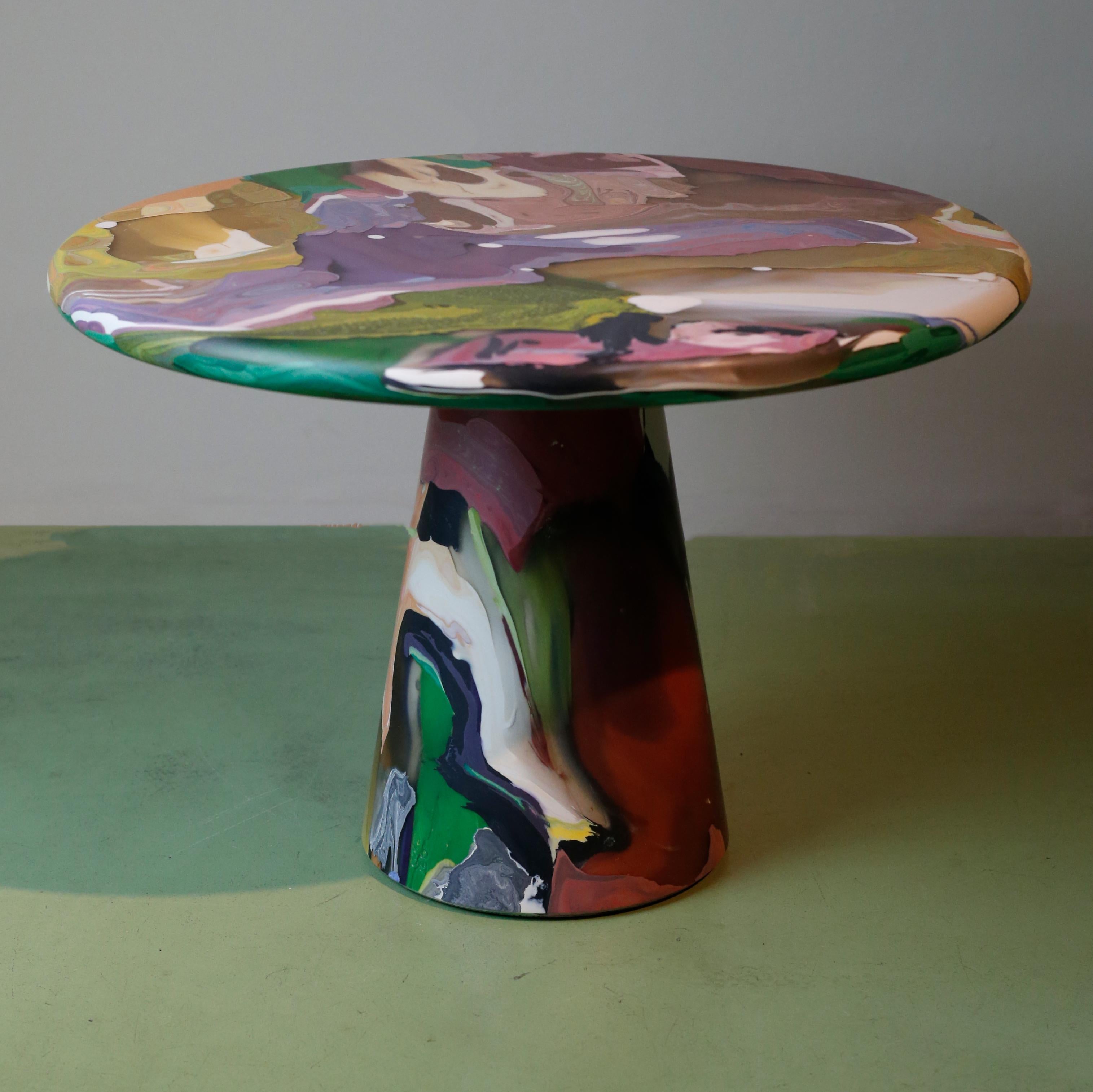 The Meltingpot table plays a keystone role in the circular design practice at Kooij. Discarded recycled plastic prototypes, production faults, and colour tests form the basis of the conglomerate Meltingpot. These multiform elements are curated and