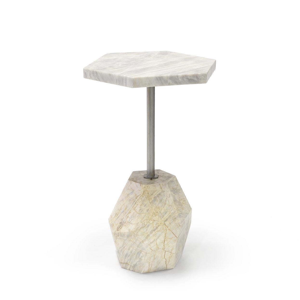 Each geometric side tables in this set is a geometrically bold design statements composed of natural materials. 

Sculptural elements with unmistakable presences - the shapes composing each table can be found in nature in the form of raw rocks.