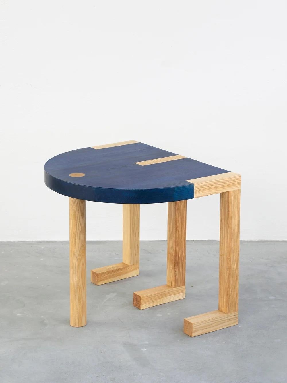 TRN Side Table
Model shown: TRN 3, Blue and natural wood

Material: Ash wood, covered with a natural wax 
Care: Clean with a dry cloth, no water, no direct sunlight 

Dimensions: 
H: 45 cm (17,7
