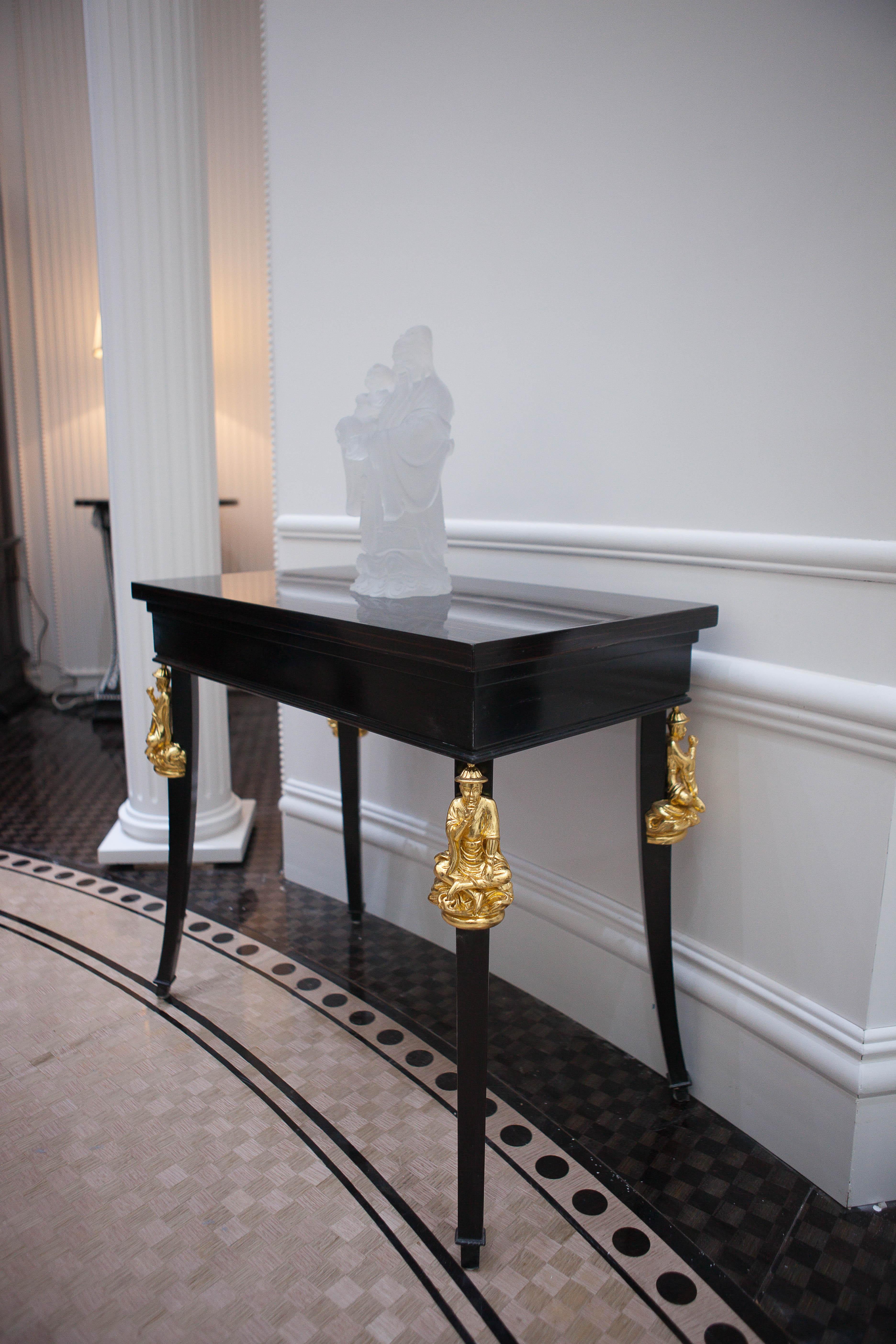 This table model, designed in the style of a contemporary vision of chinoiserie, is part of the 