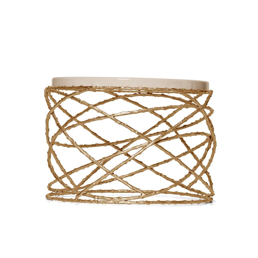 Eternalized rosebush branches, molded in brass casting, give a perennial feel to this elegant table. The bottom structure is assembled by hand by artisans, while the minimalistic top offers a soothing and quiet balance to this piece.
Top: