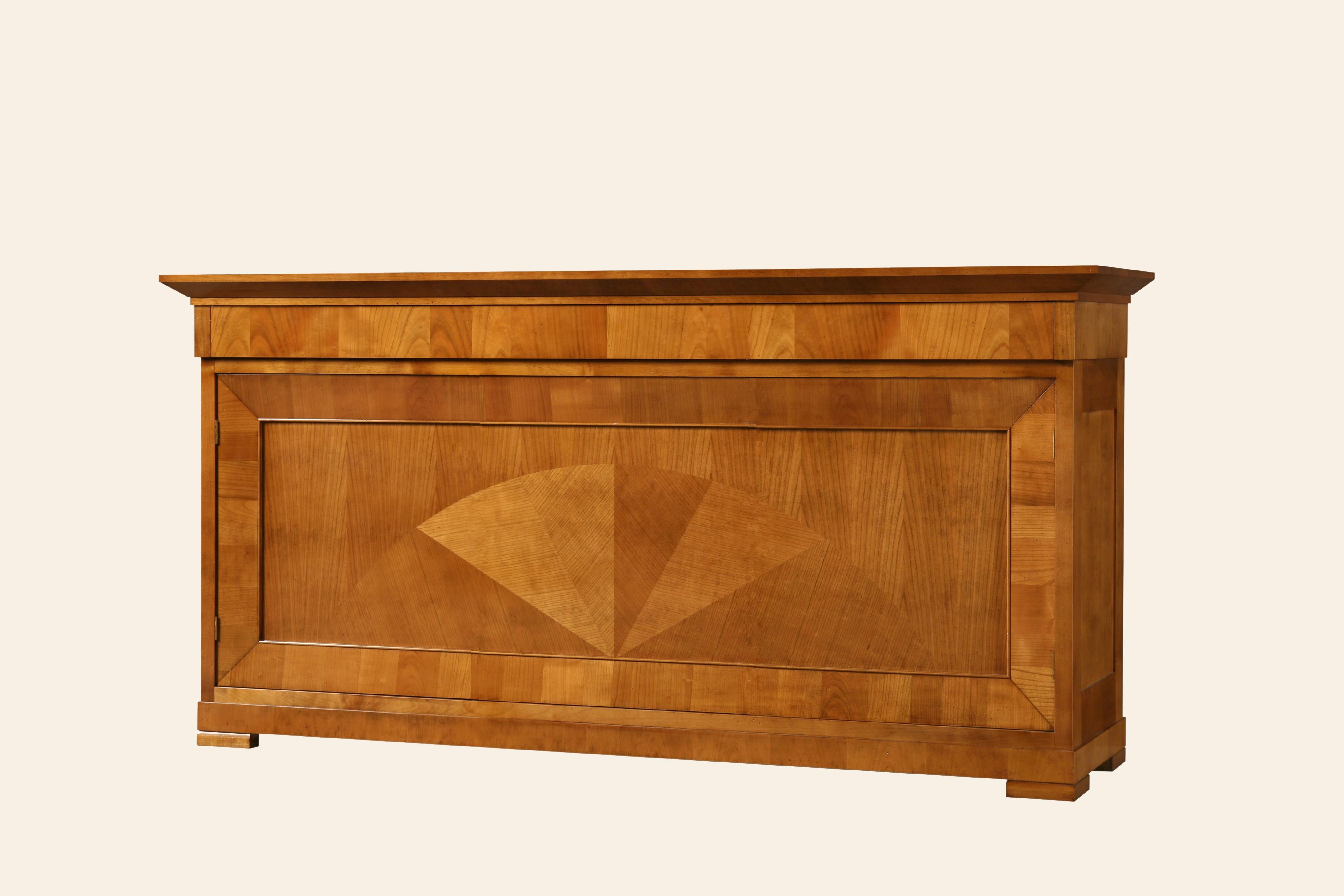 Contemporary sideboard in Biedermeier style, made of cherrywood.
Three doors and three drawers. Adjustable shelves inside
Precious inlay on the front doors.
MAde in Italy by Morelato


 
