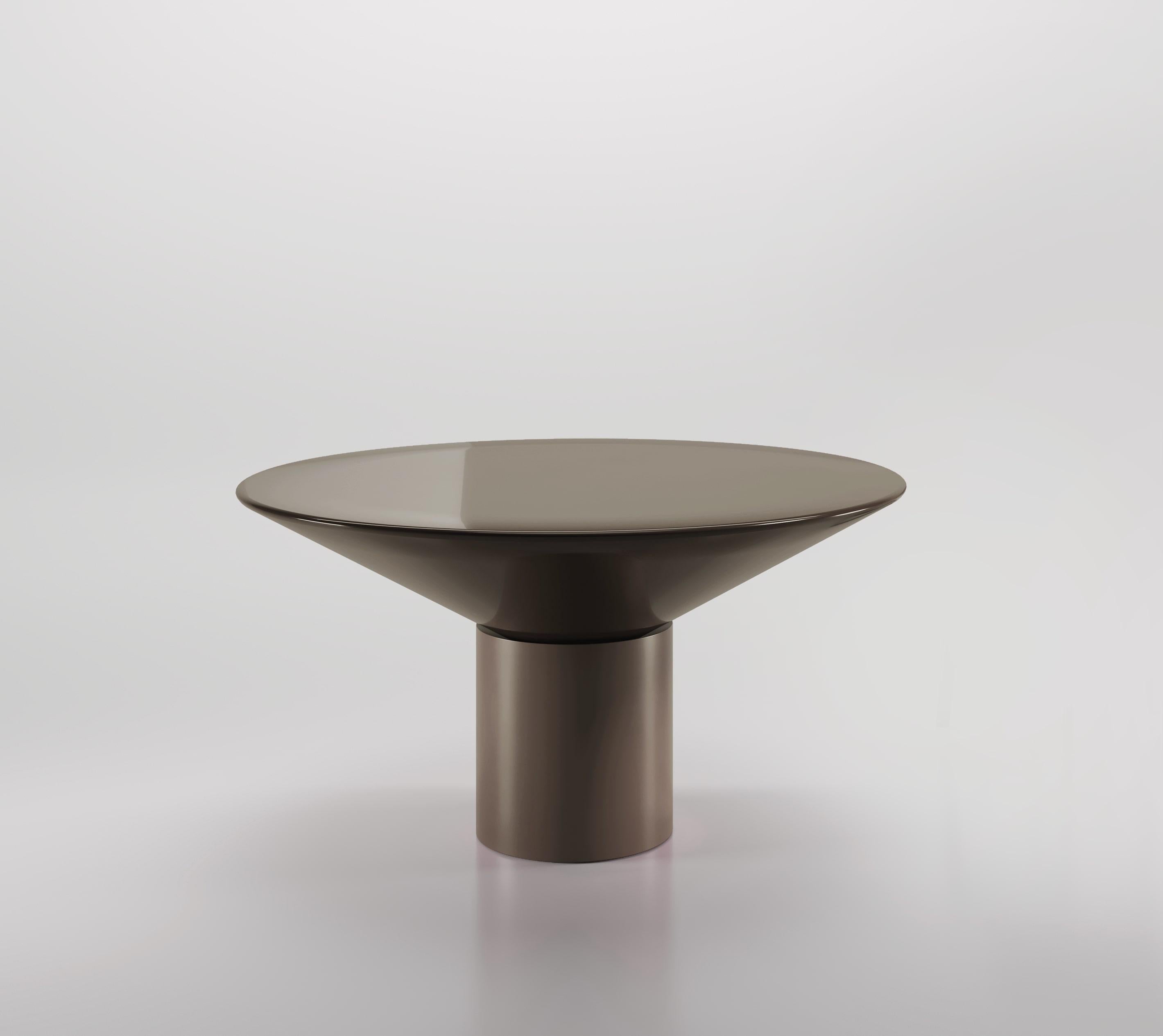 Silo Dining Table is an impactful piece designed to explore the usual characteristics of a dining table. For the Silo Dining Table the base and top communicate and coincide harmoniously, both working together to create a piece that is as visually