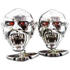 Contemporary Silver Cufflinks, Dracula Head, Red Bead Eyes, Stephen Webster