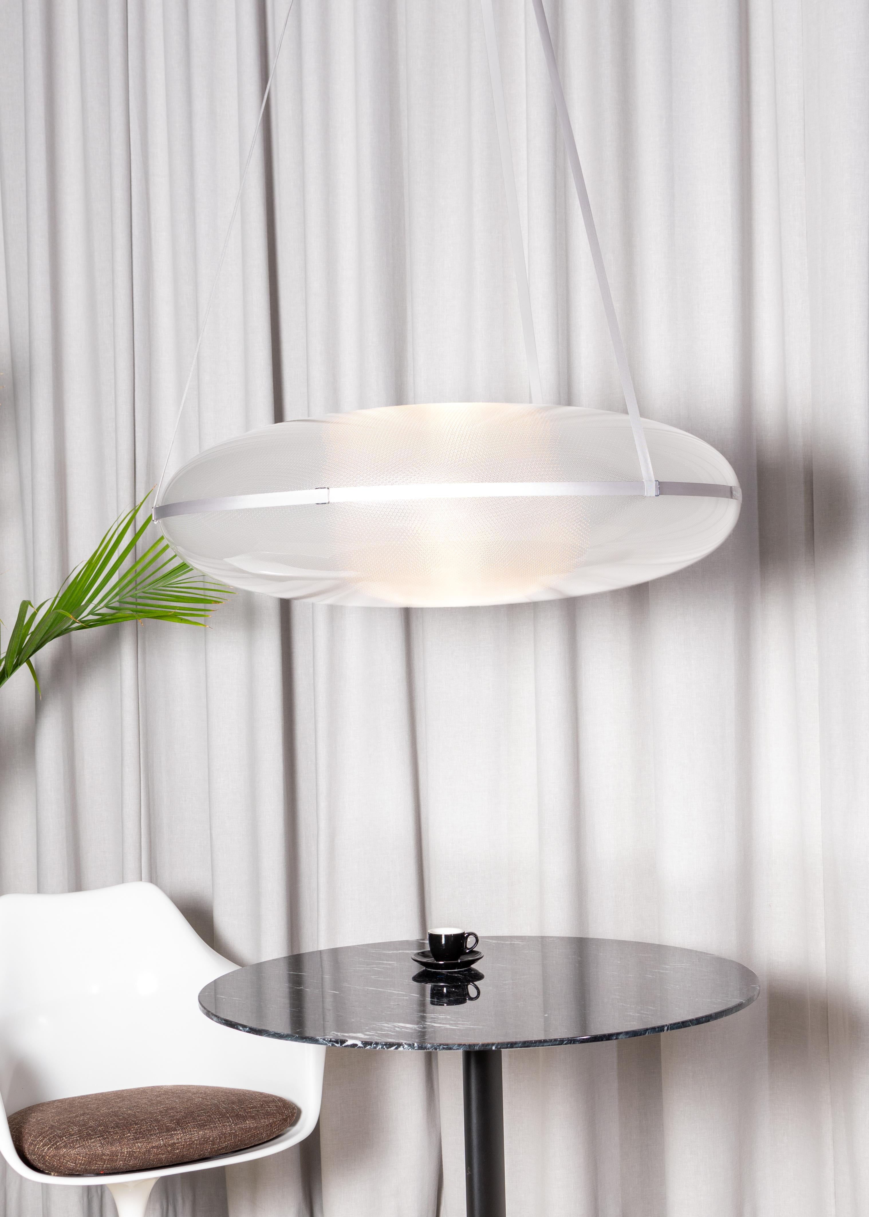 Contemporary pendant lamp 'Iris'

Electrical : 
Voltage: 120 V – 277 V 
Lamp: Integral 34 W 35 V DC LED

The model shown in picture:
- Diameter: 90 cm Height. 60 cm 
- Finish: Silver
- Wire height: 300 cm (adjustable drop length)
- Modules :