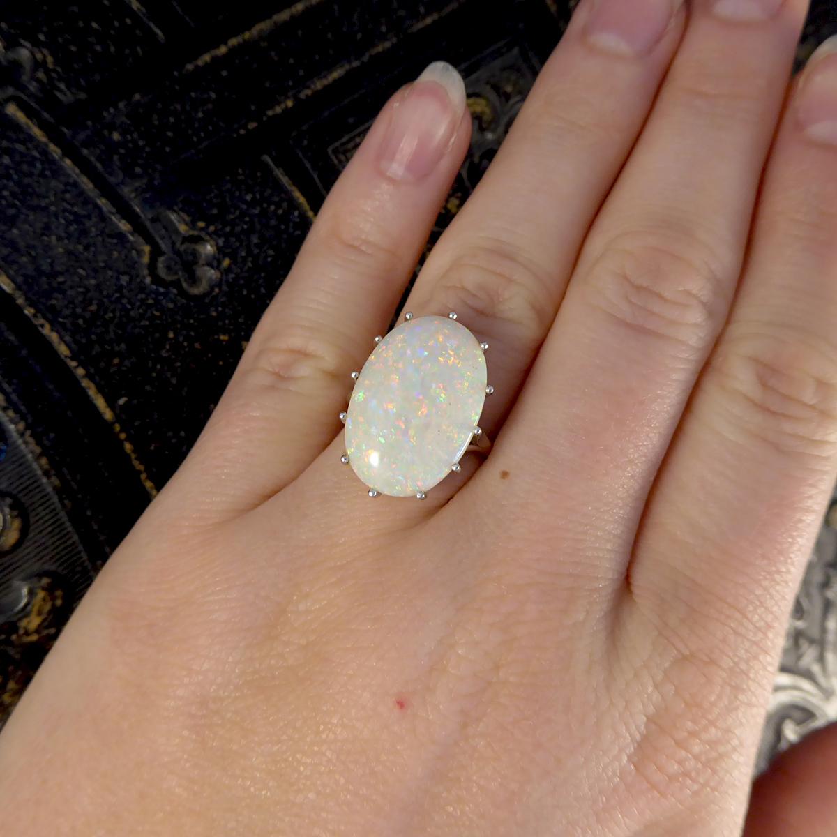 Contemporary Single Oval Colorful Opal Ring in 18 Carat White Gold In Good Condition For Sale In Yorkshire, West Yorkshire