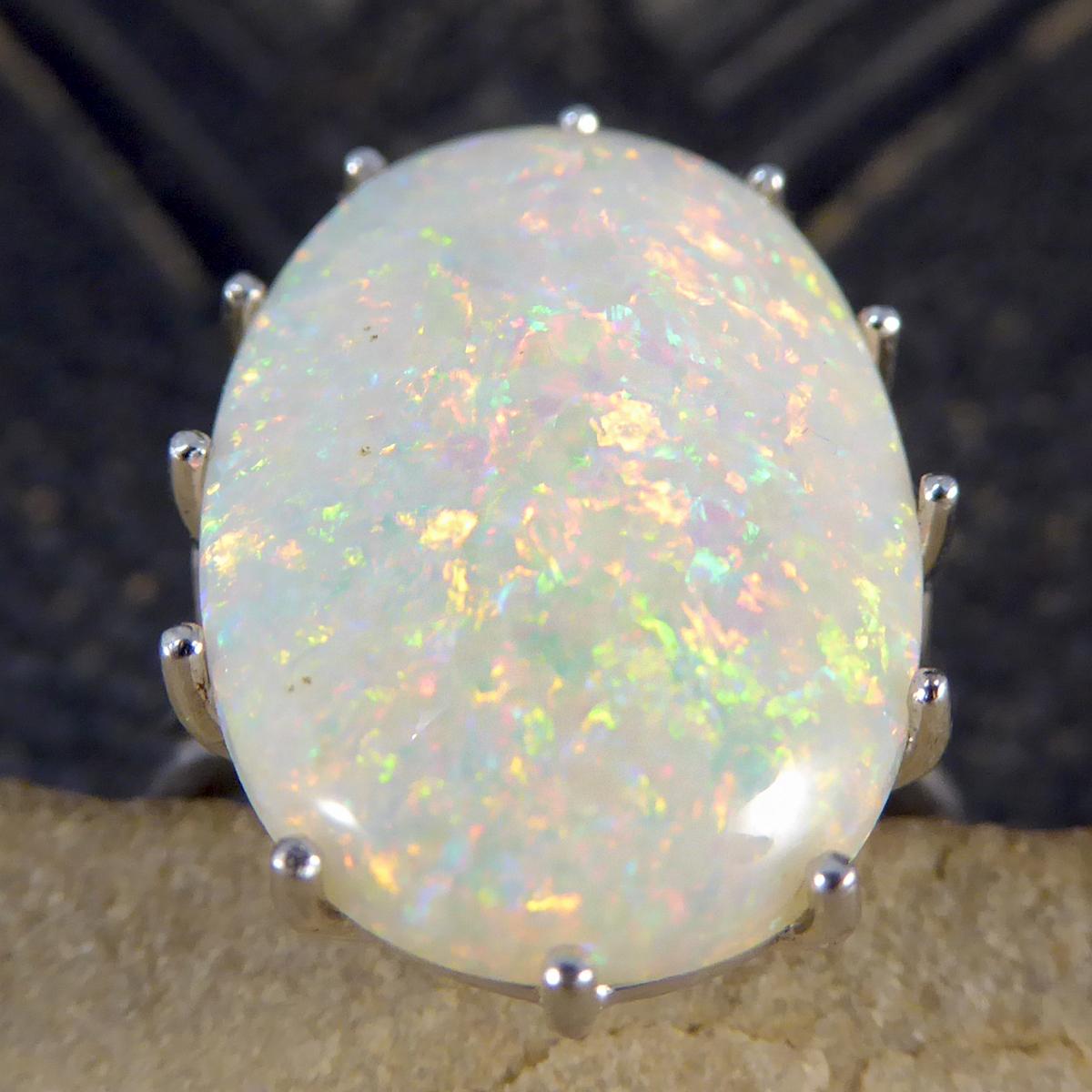 Women's or Men's Contemporary Single Oval Colorful Opal Ring in 18 Carat White Gold For Sale