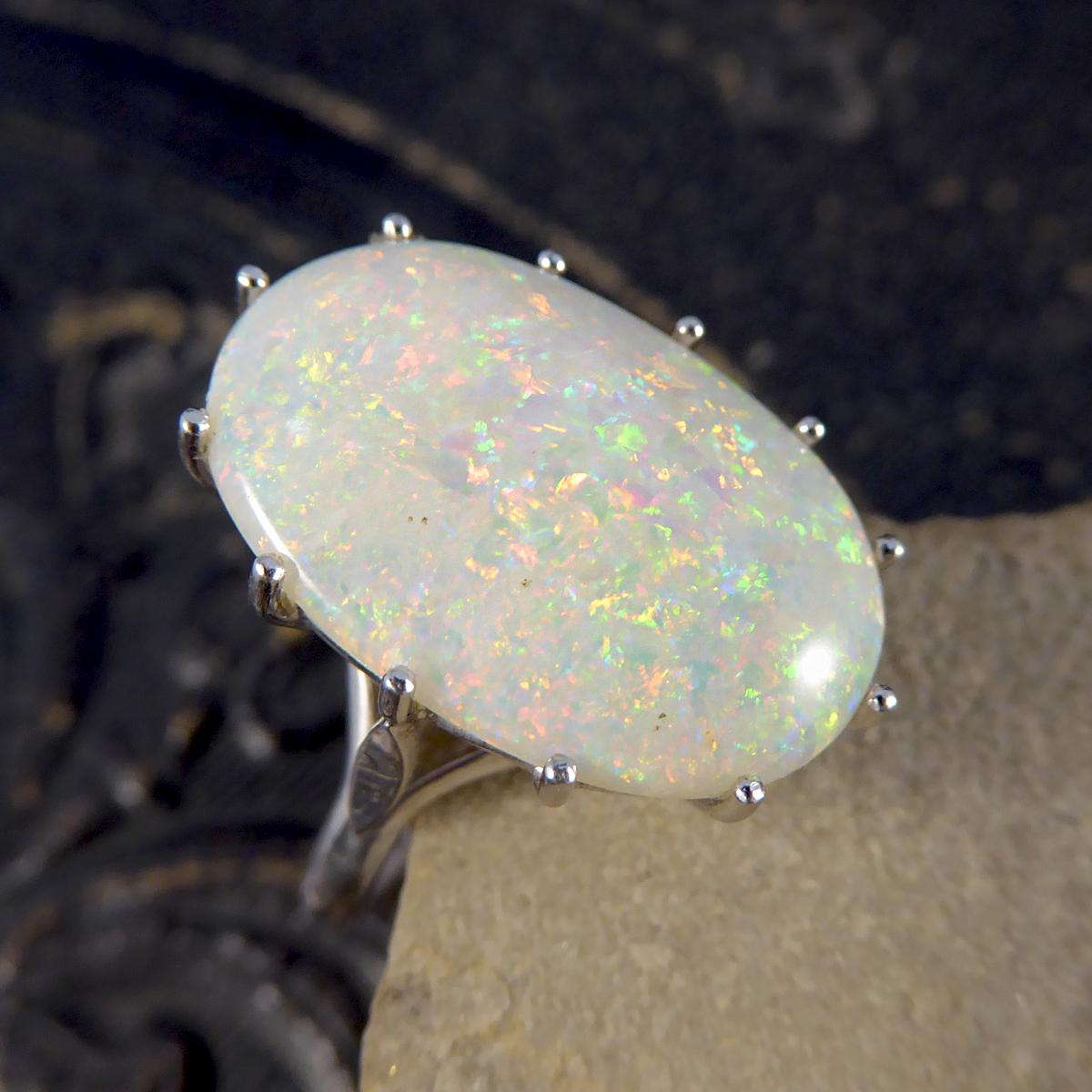 Contemporary Single Oval Colorful Opal Ring in 18 Carat White Gold For Sale 1
