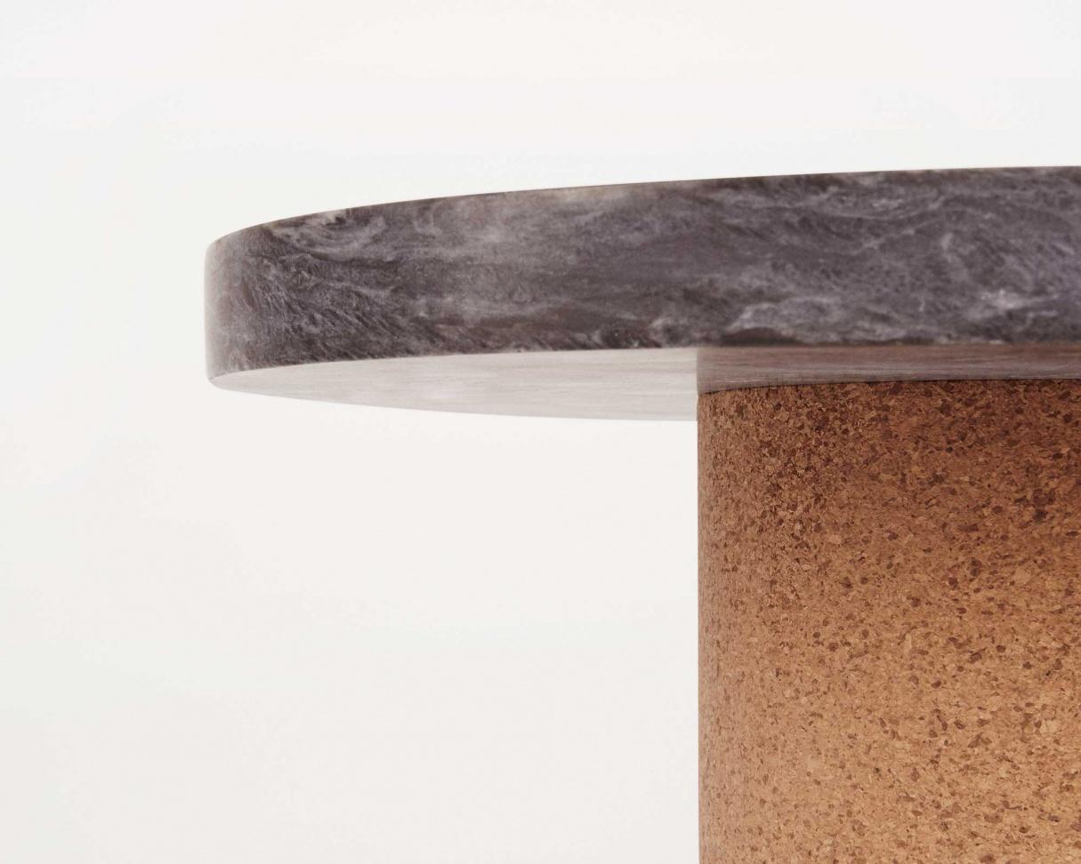 Suitable as a coffee table or side table where the contrast between the soft warm cork, meets the cold smooth marble. The distinction between the two shapes gives the impression of two worlds meeting one another.

Note: Variations can appear due to